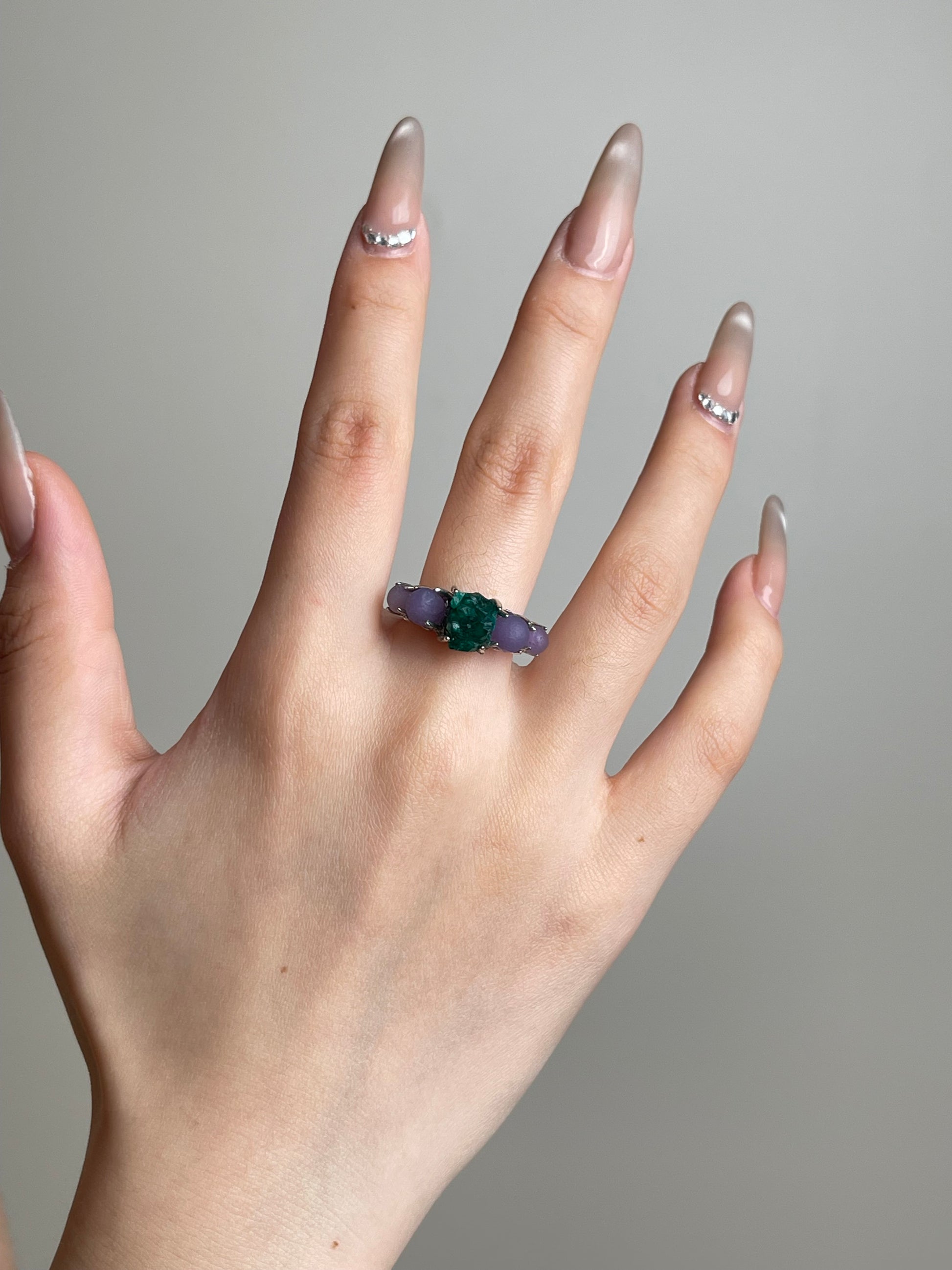 Purple Grape Agate and Dioptase ring worn on hand by Oryssia