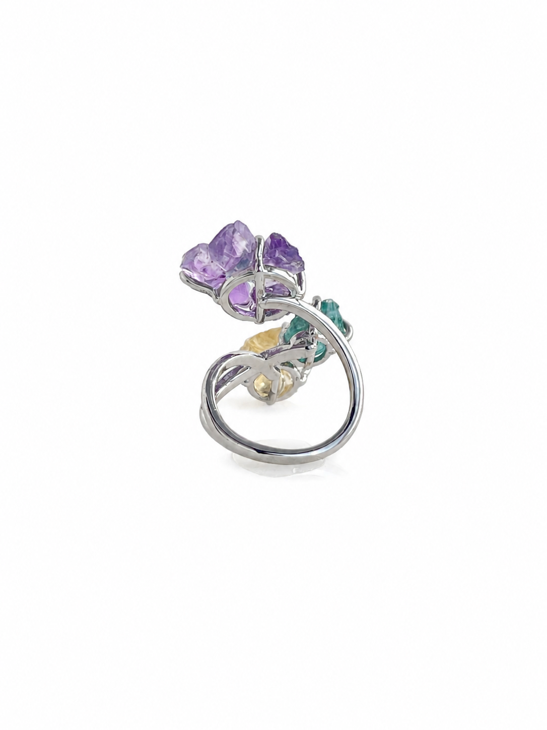 Back view of raw amethyst, aquamarine, blue apatite and citrine ring with silver tone band