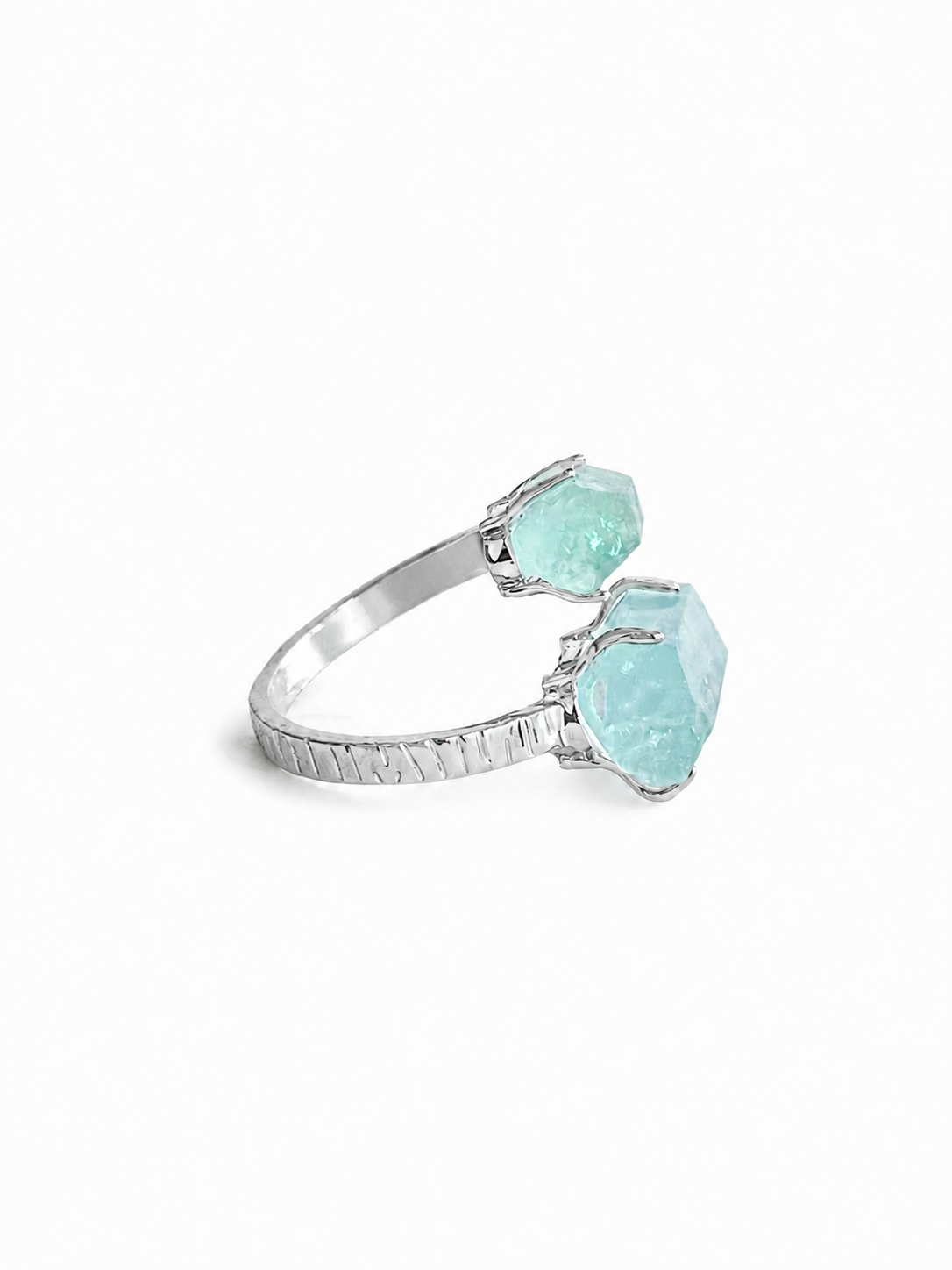 Side view of raw Aquamarine hexagonal crystal ring with palladium plated band