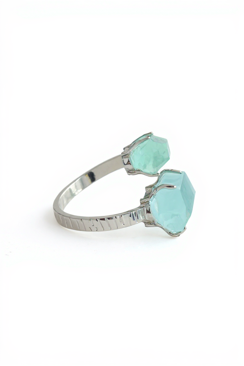 Side view of raw Aquamarine hexagonal crystal ring with palladium plated band