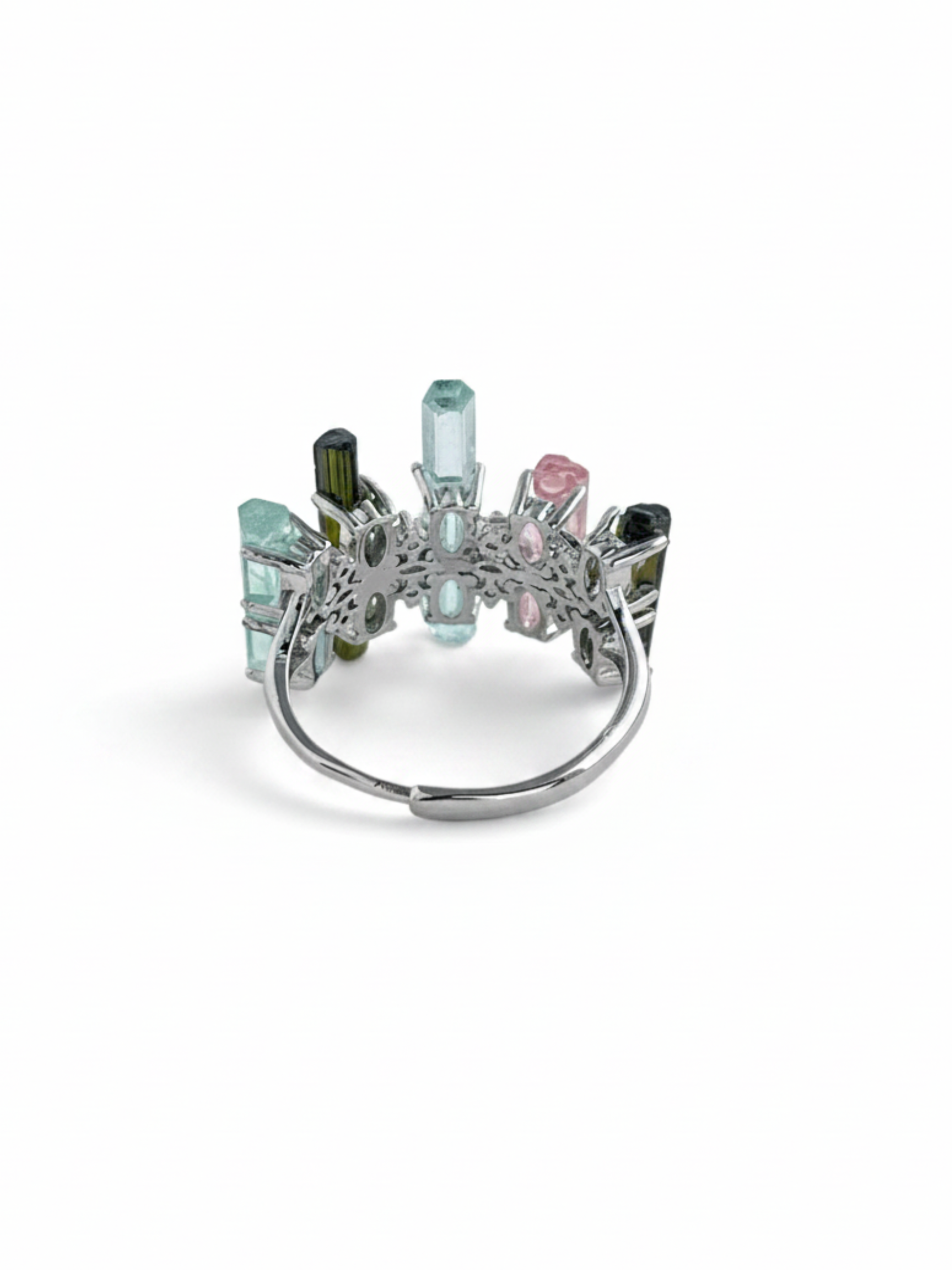 Back view of raw aquamarine, green tourmaline and morganite ring with adjustable open band and silver-tone finish