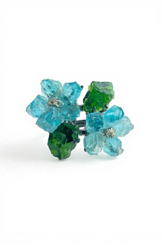 Raw Blue Apatite flower ring with Chalcopyrite center and Chrome Diopside accents, front view
