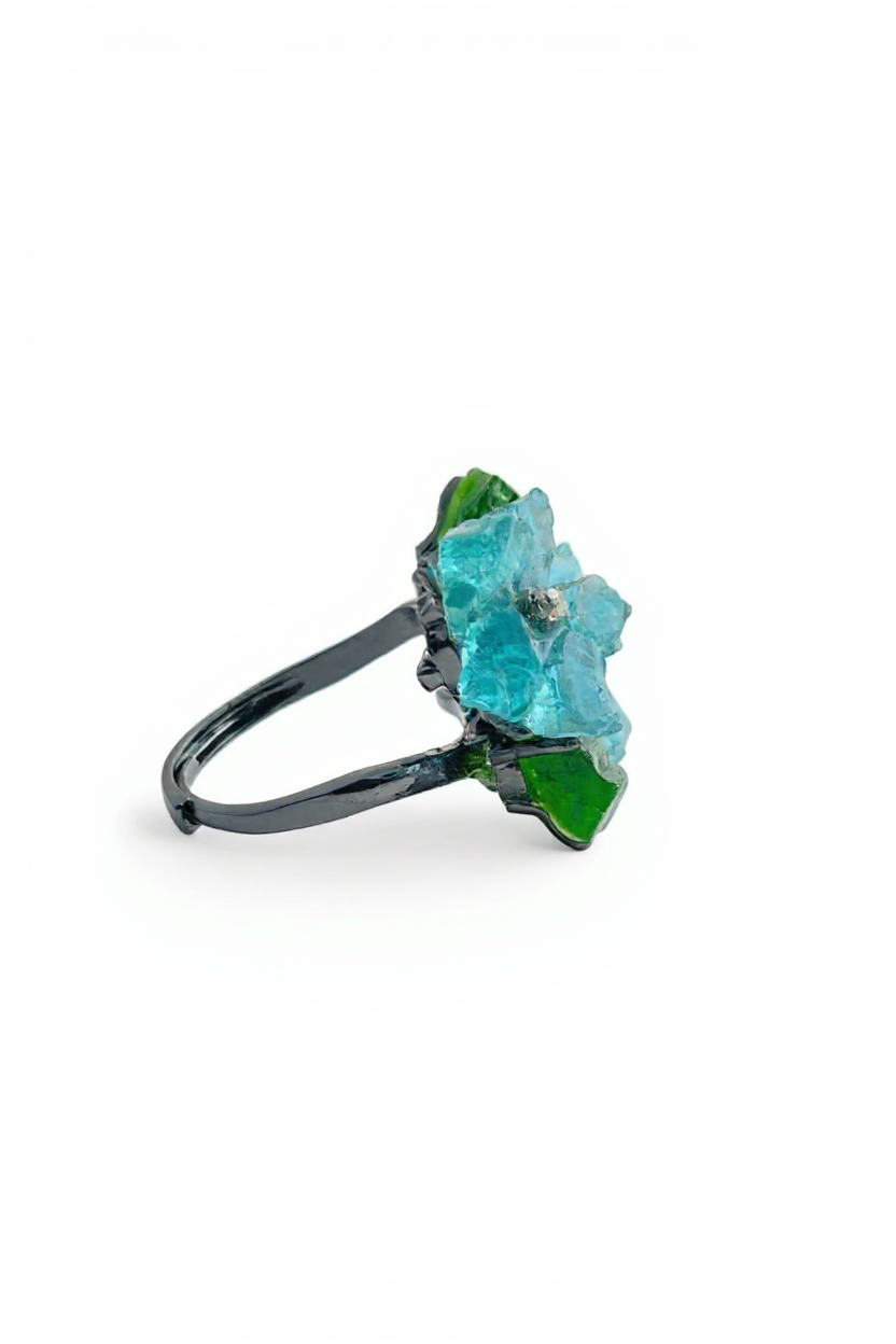Side view of Raw Blue Apatite flower crystal ring with mineral specimen setting
