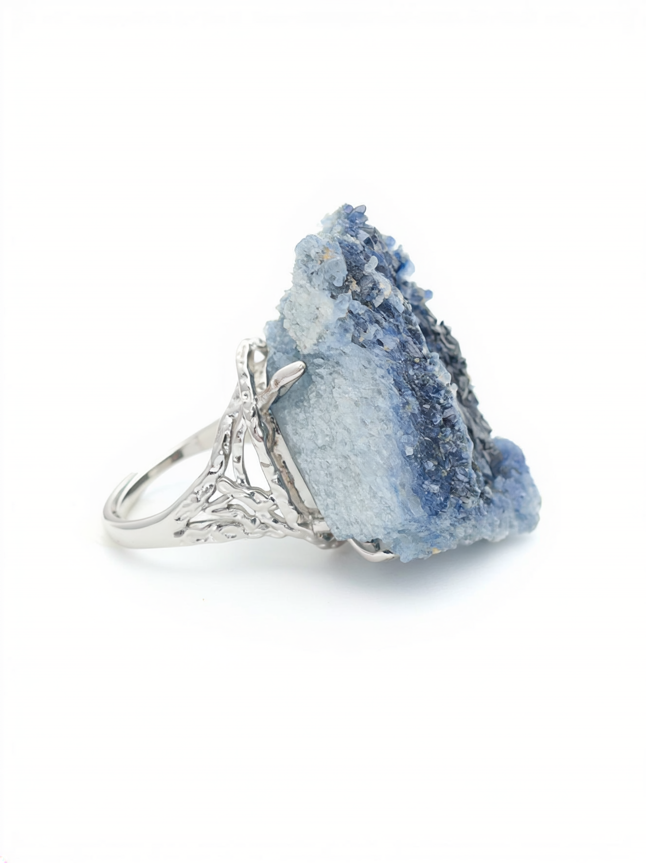 Side view of a raw Blue Sapphire crystal cluster ring.
