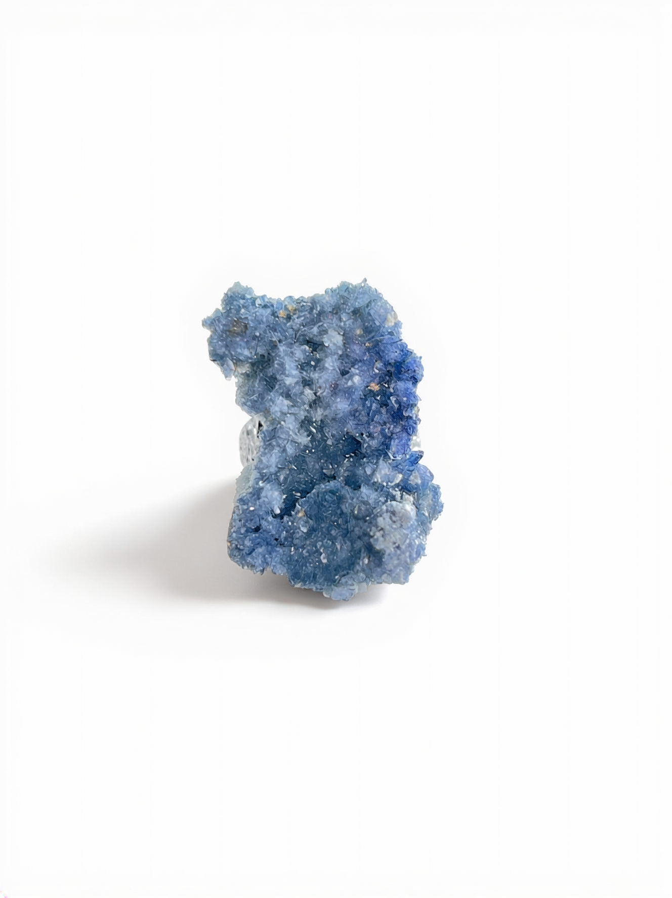 Raw Blue Sapphire crystal ring, front view.