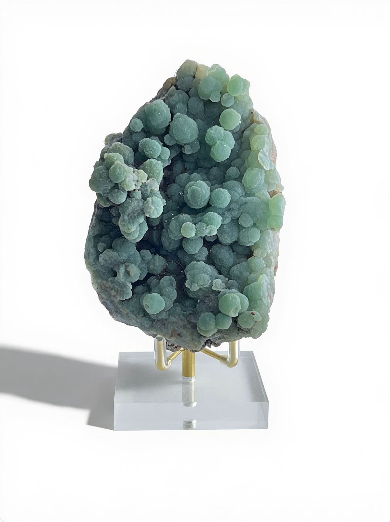 Raw botryoidal green prehnite mineral specimen from Morocco with display stand, front view