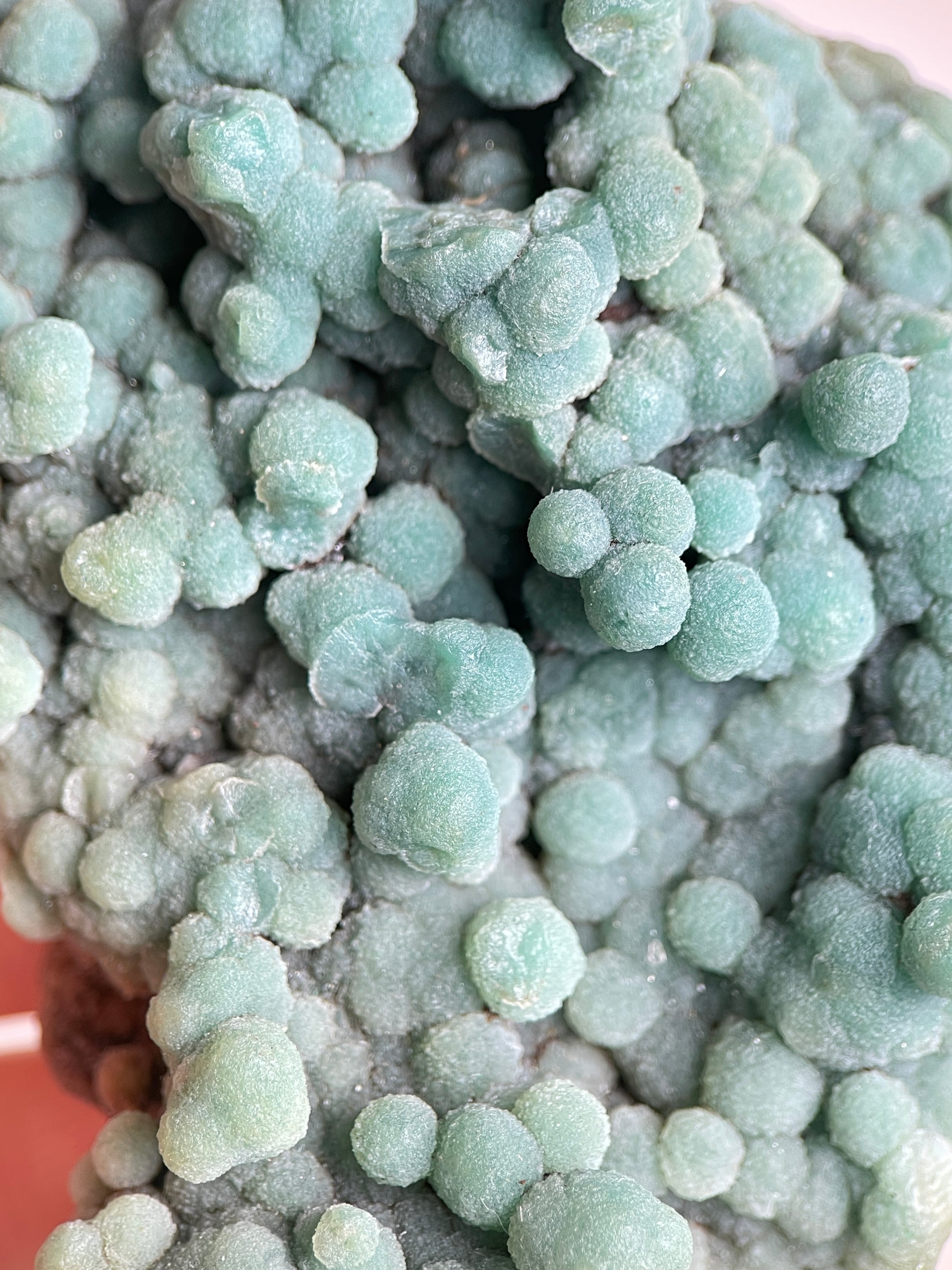 Close-up of green prehnite showing natural rounded botryoidal crystal texture