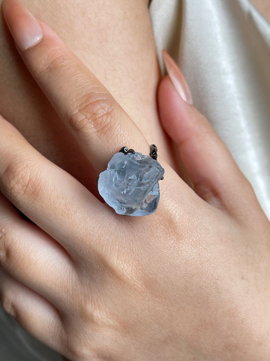 Raw Celestite Crystal Ring from Madagascar, close-up on hand