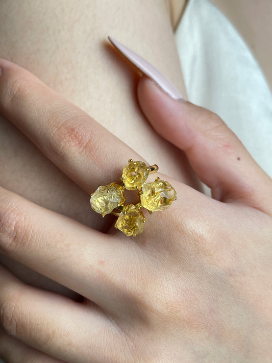 Close-up hand wearing raw Brazilian Citrine crystal ring