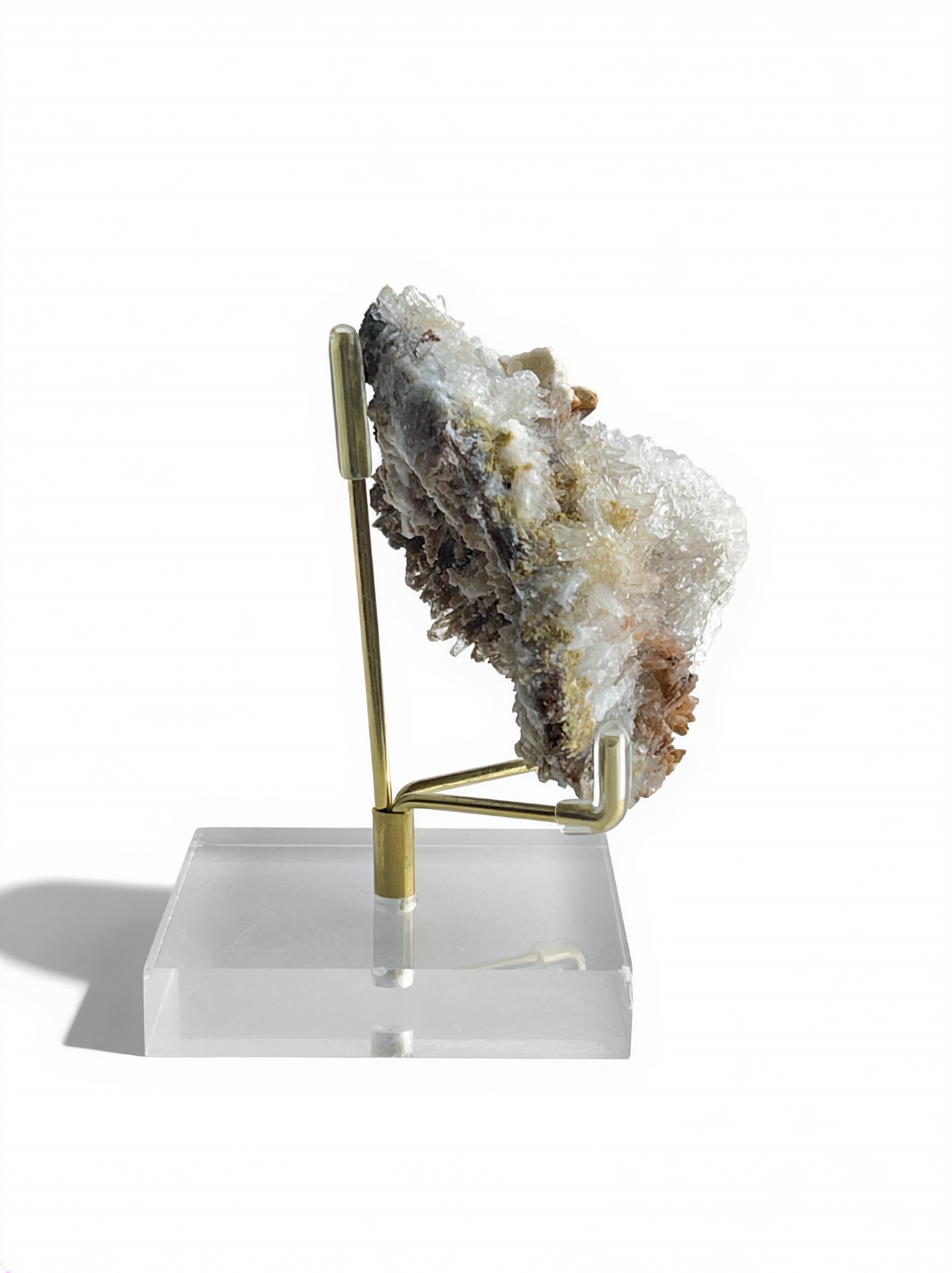 Side view of Raw Creedite cluster mineral specimen on natural matrix