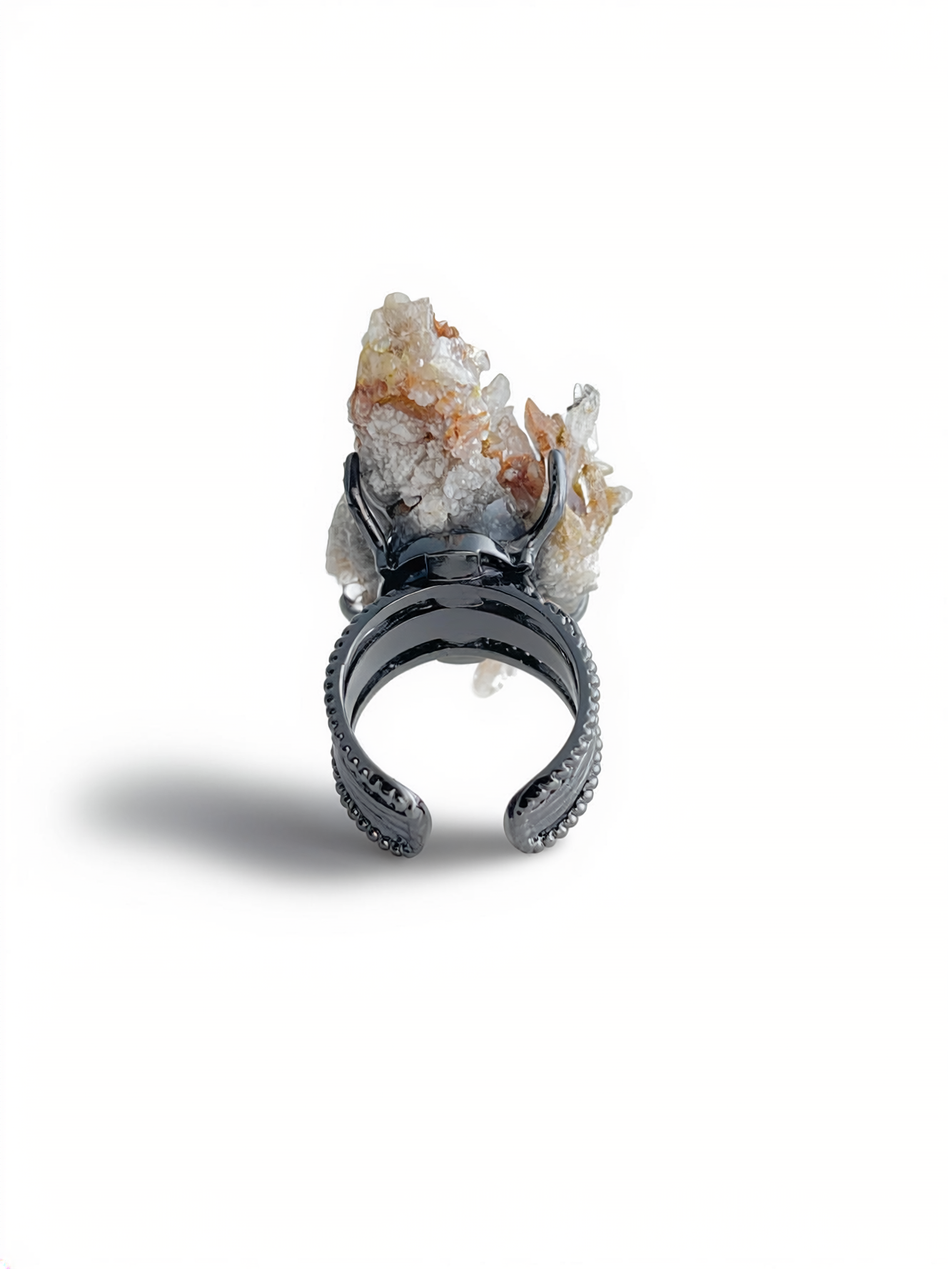 Back view of a raw Creedite crystal cluster ring.