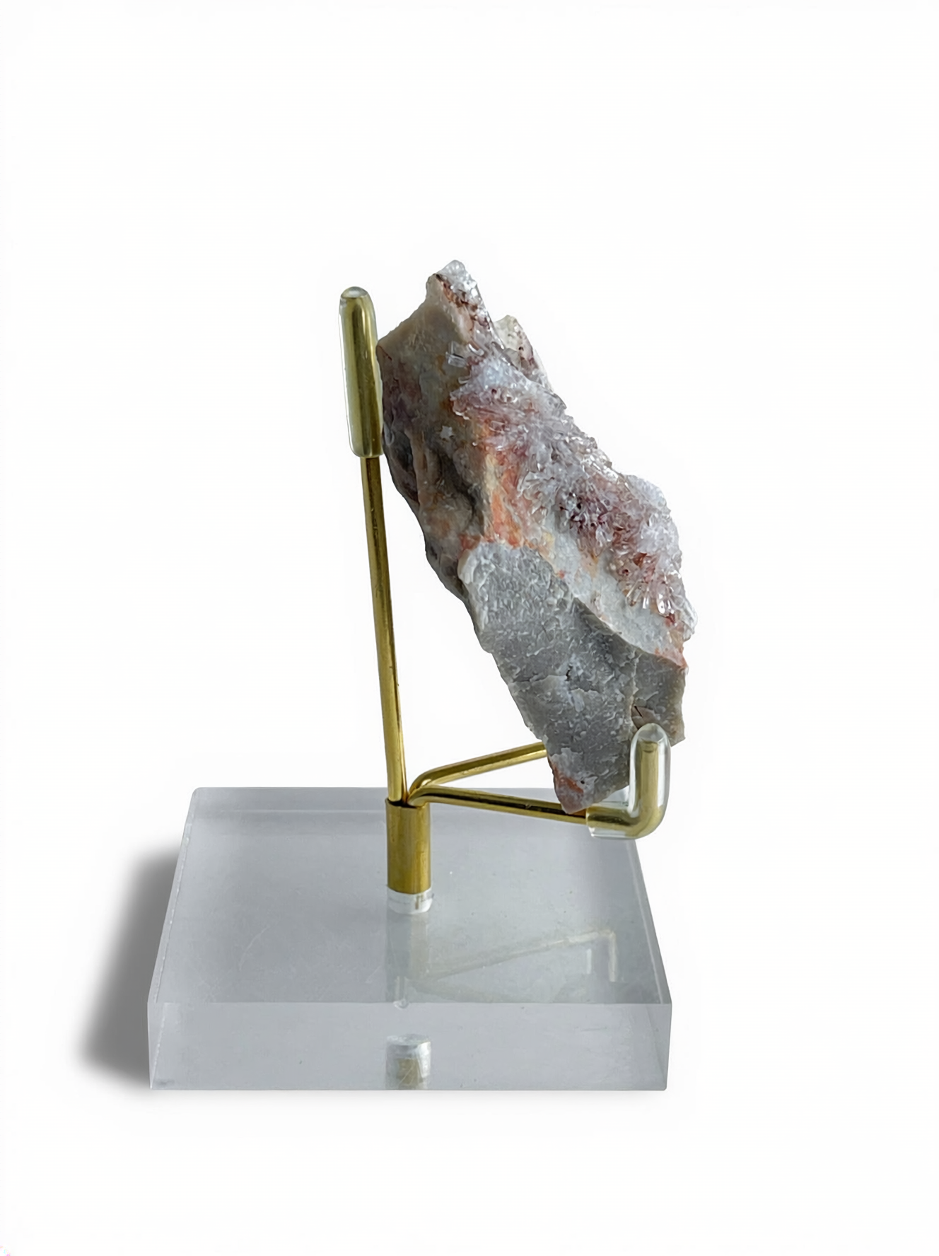 Side view of Raw Creedite flower mineral specimen on matrix