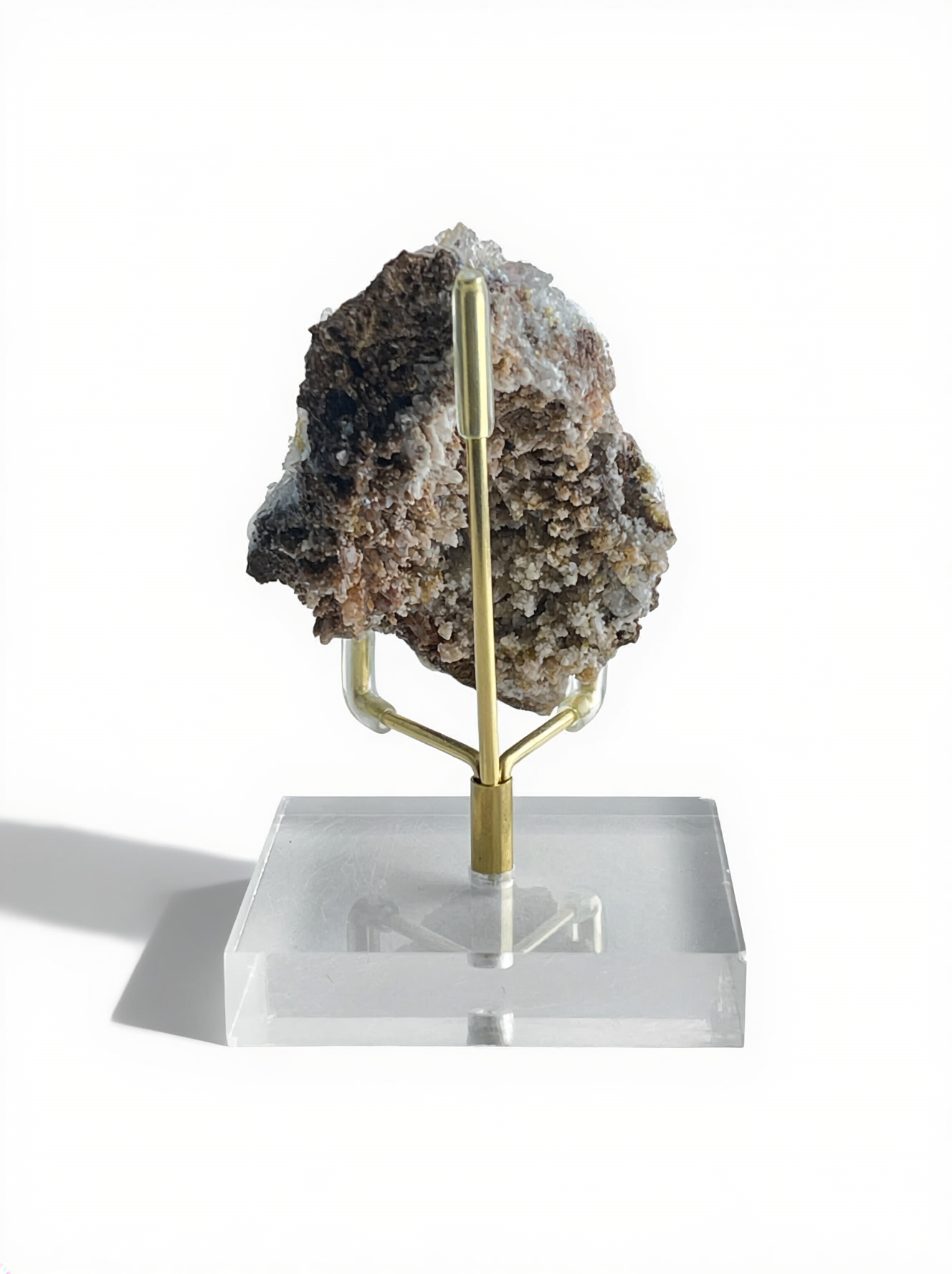 Back view of Raw Creedite mineral specimen showing earthy host rock texture