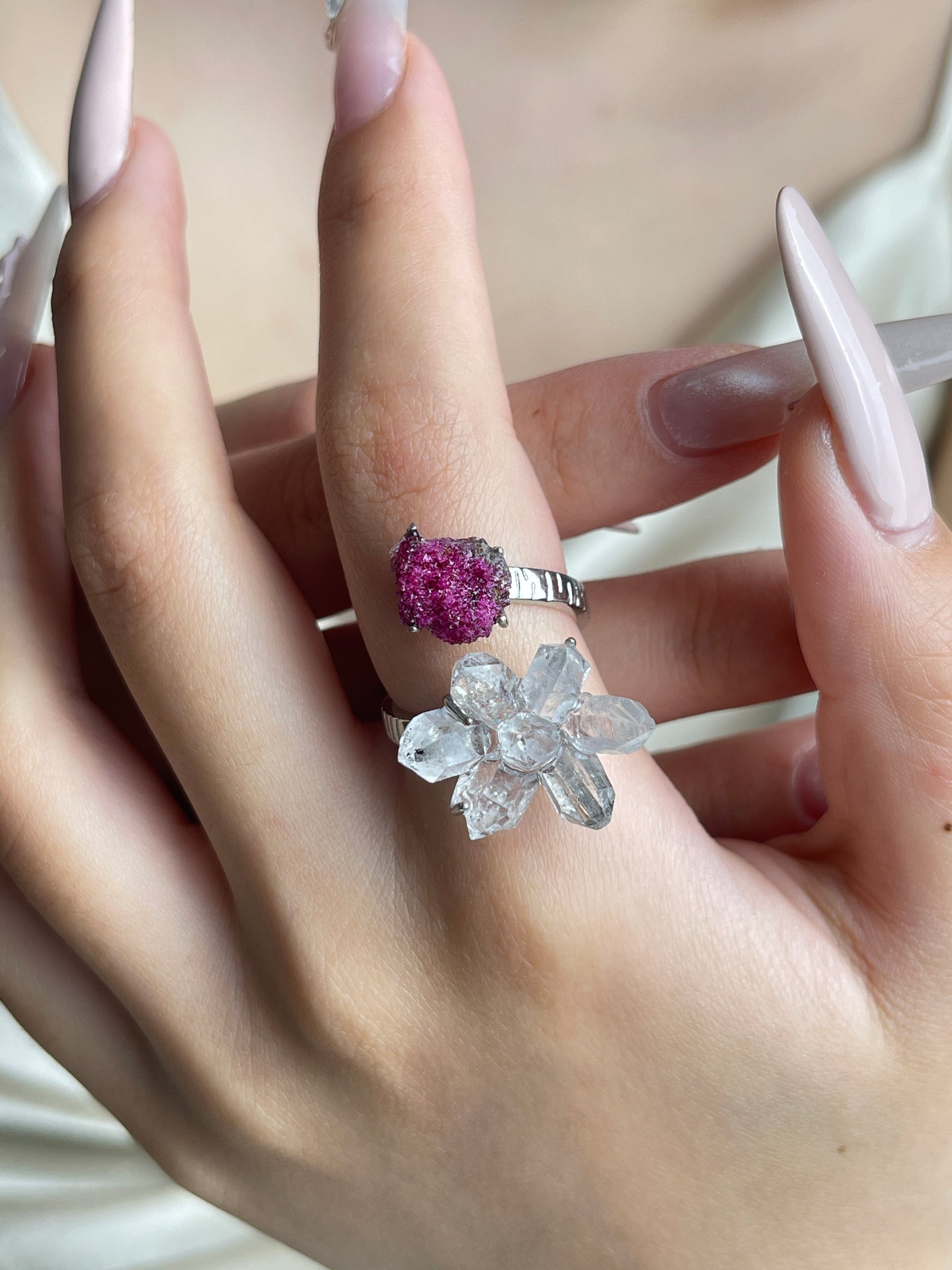 Raw crystal Herkimer Diamond Quartz and ruby ring worn on hand
