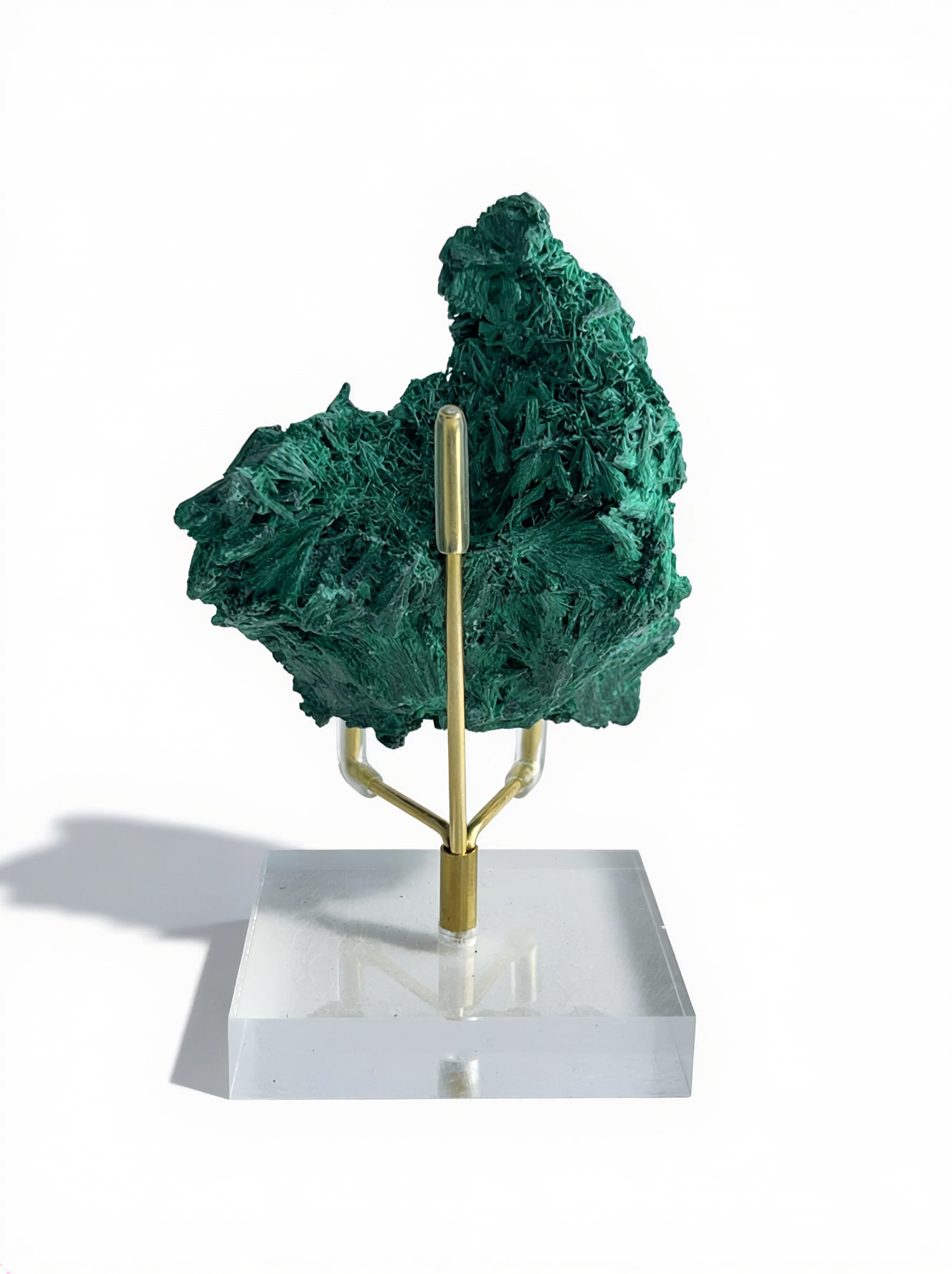 Back view of raw fibrous malachite cluster mineral specimen on acrylic display stand