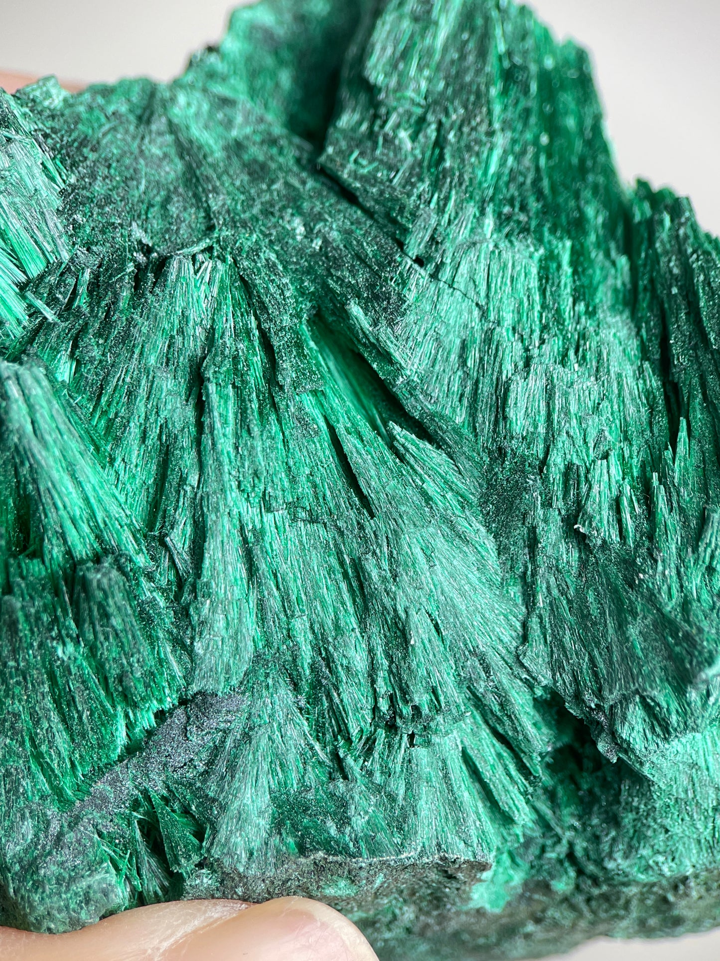 Detail of fibrous malachite showing fine needle-like green crystal texture