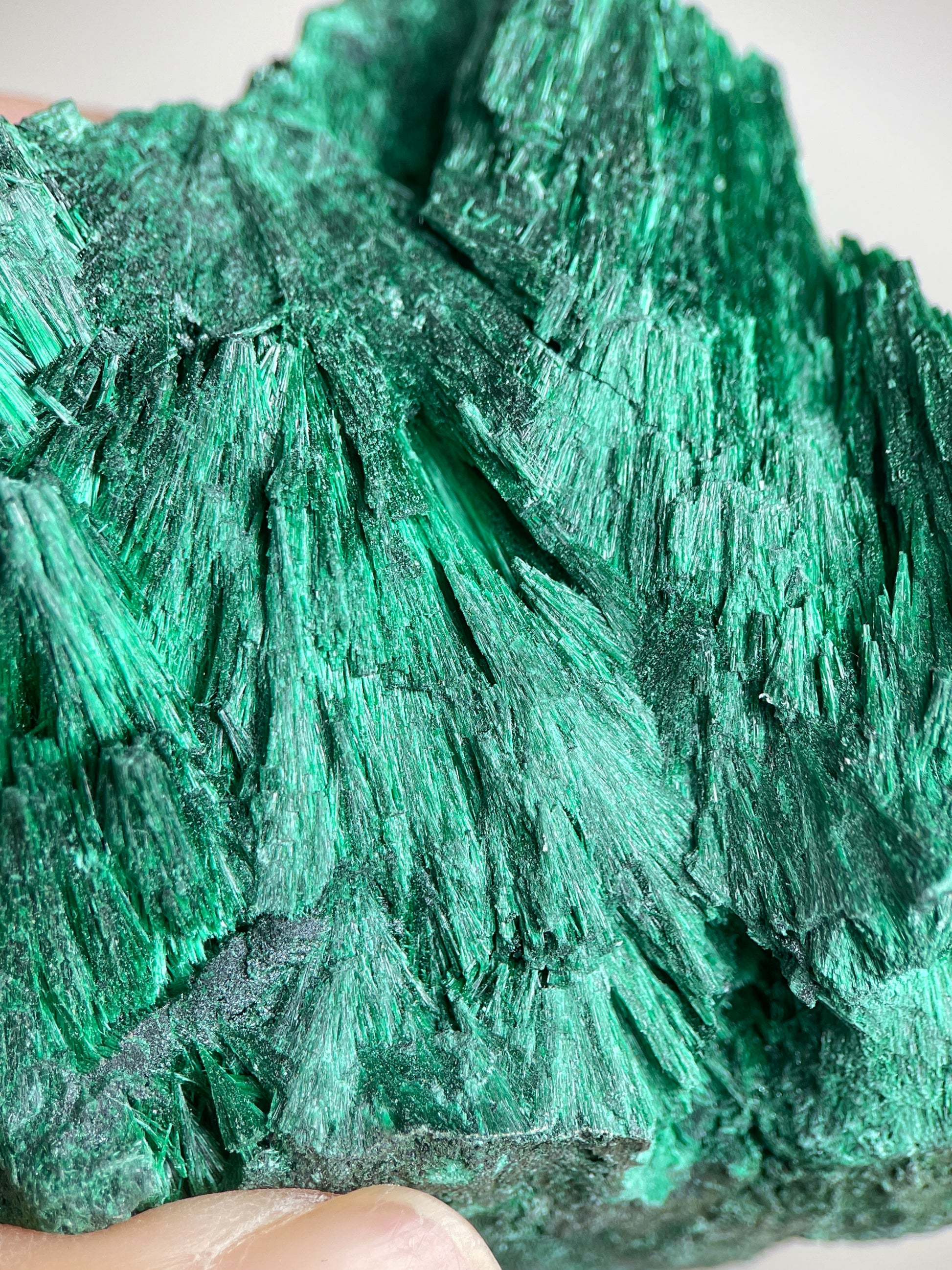 Detail of fibrous malachite showing fine needle-like green crystal texture