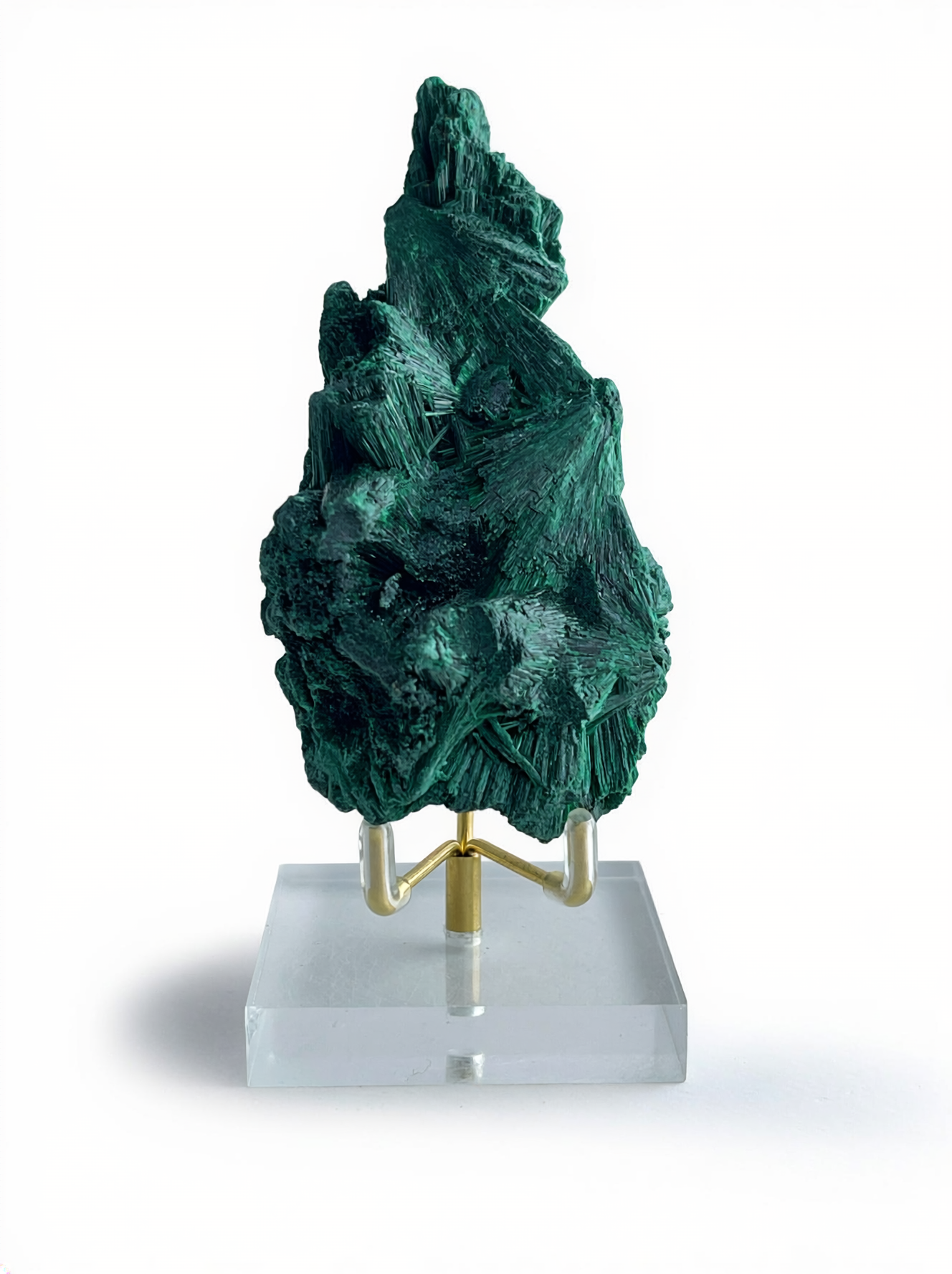 Raw fibrous malachite mineral specimen with display stand, front view