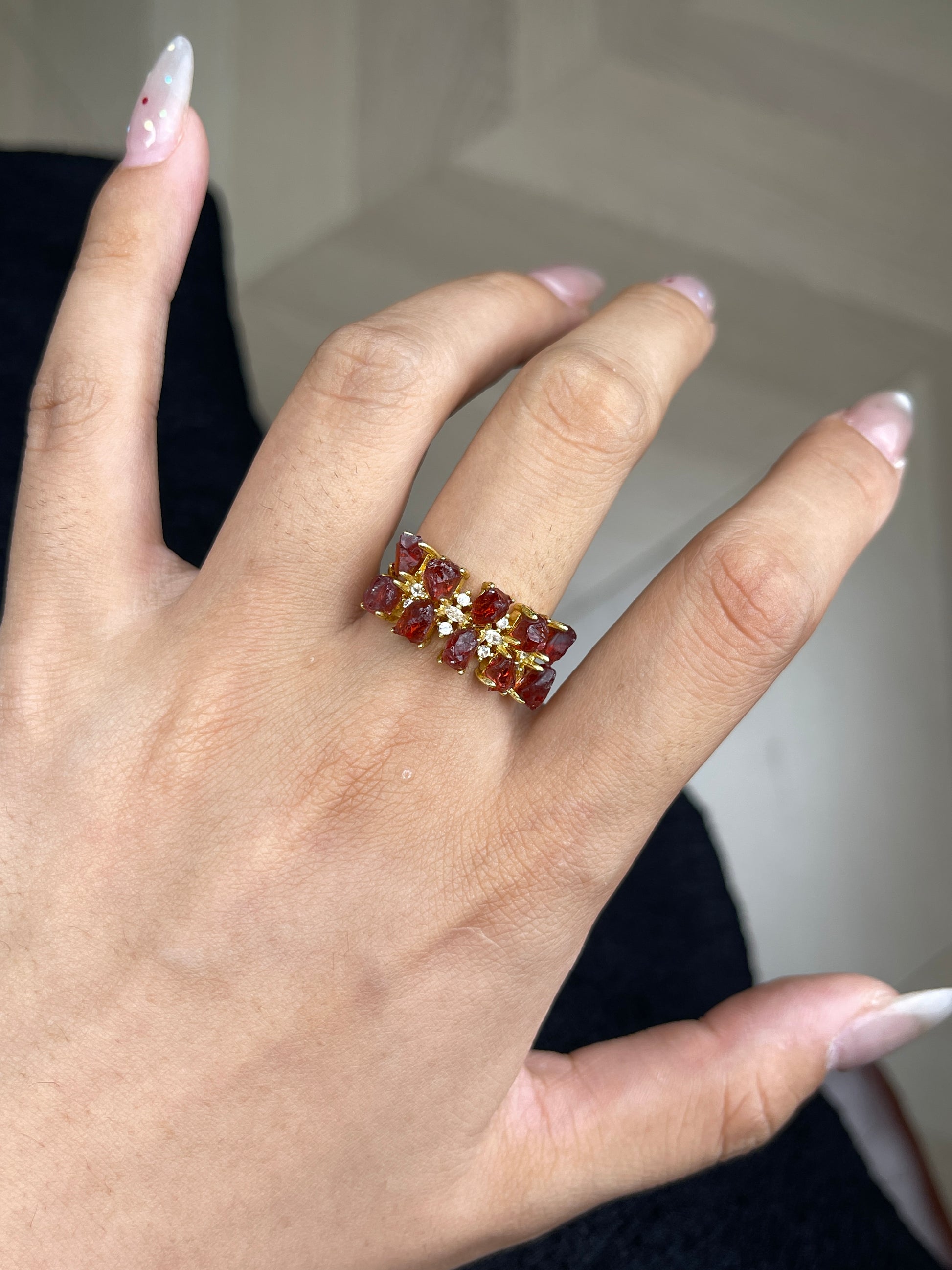 close up look raw garnet double row ring