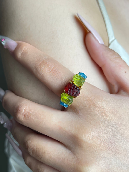 Raw Garnet, Peridot and Blue Apatite Crystal Ring worn close up