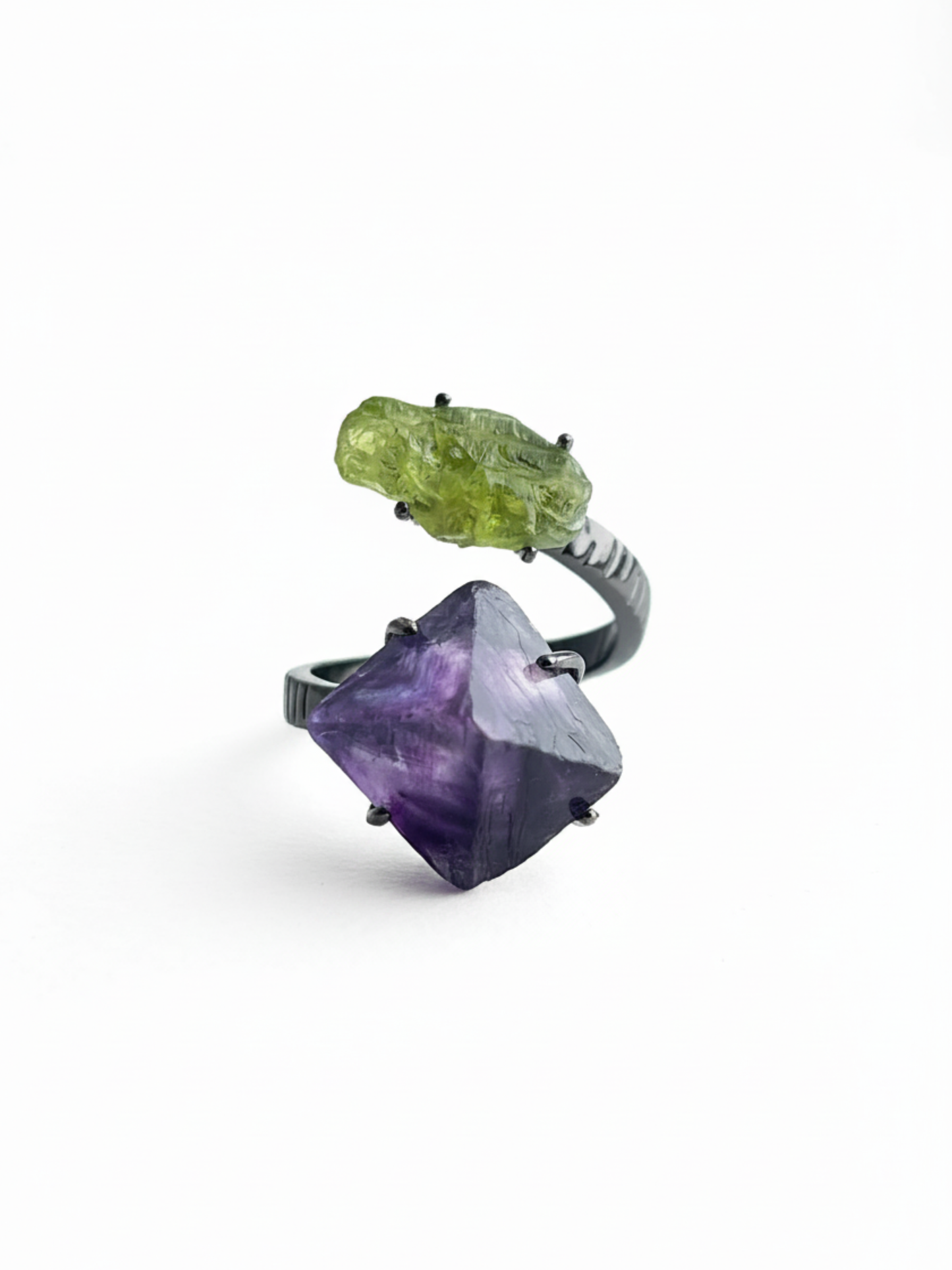 Raw peridot and purple octahedral fluorite ring front view