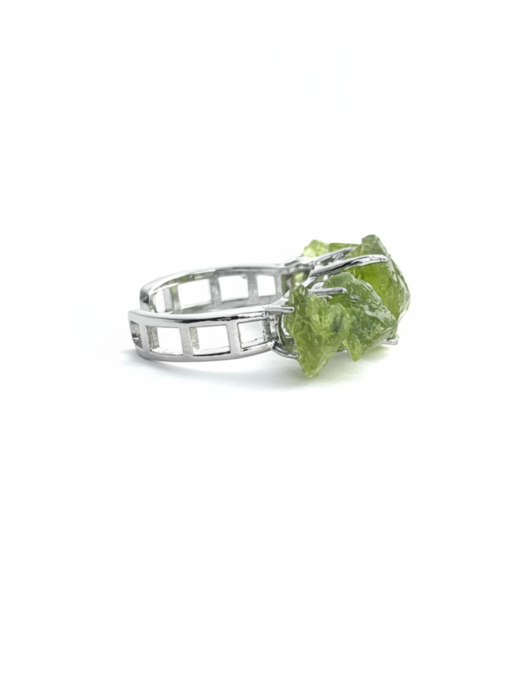 side view raw peridot crystal ring