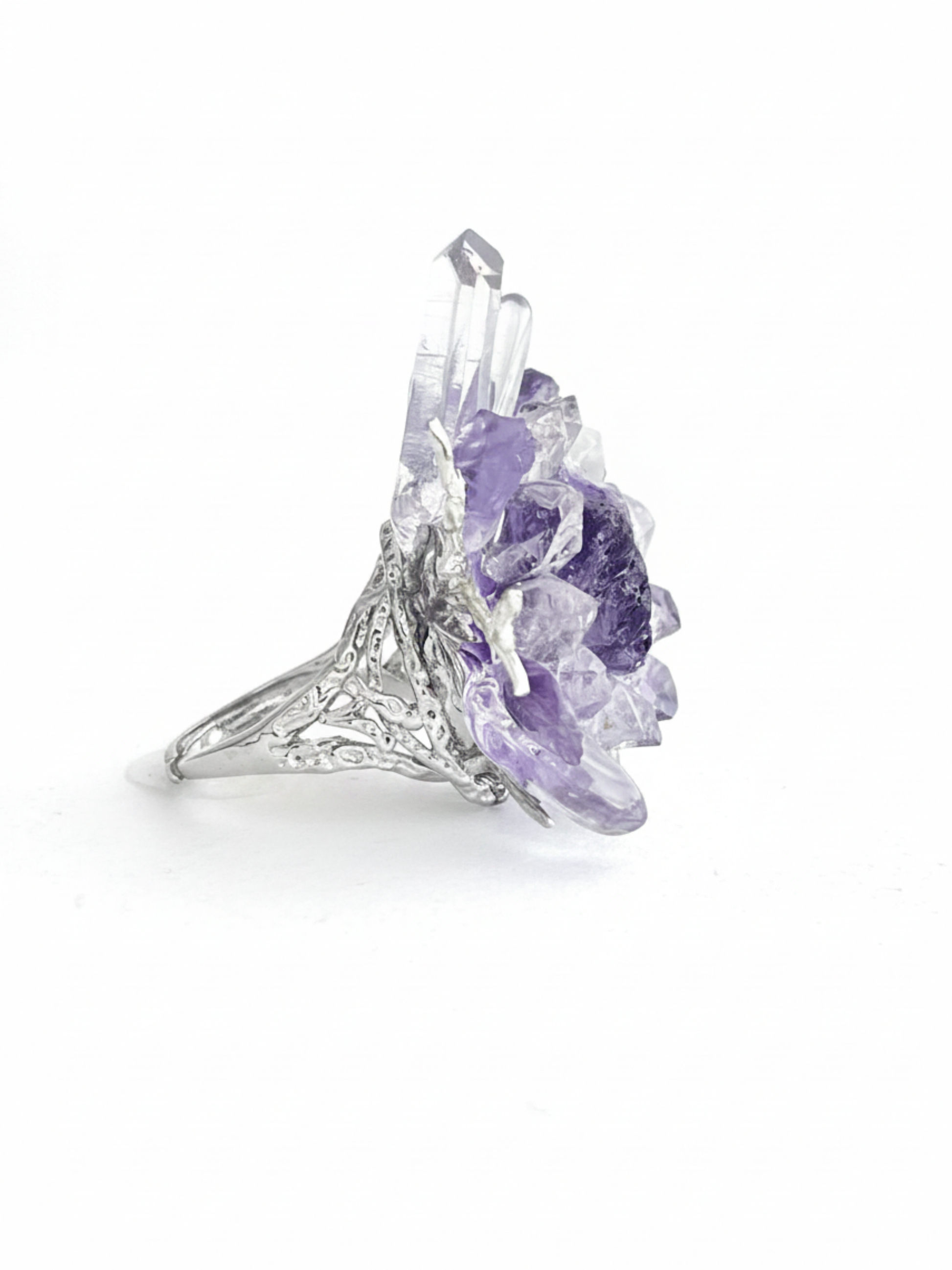 Side view of raw Purple Fluorite and Amethyst mineral specimen ring with clear quartz points