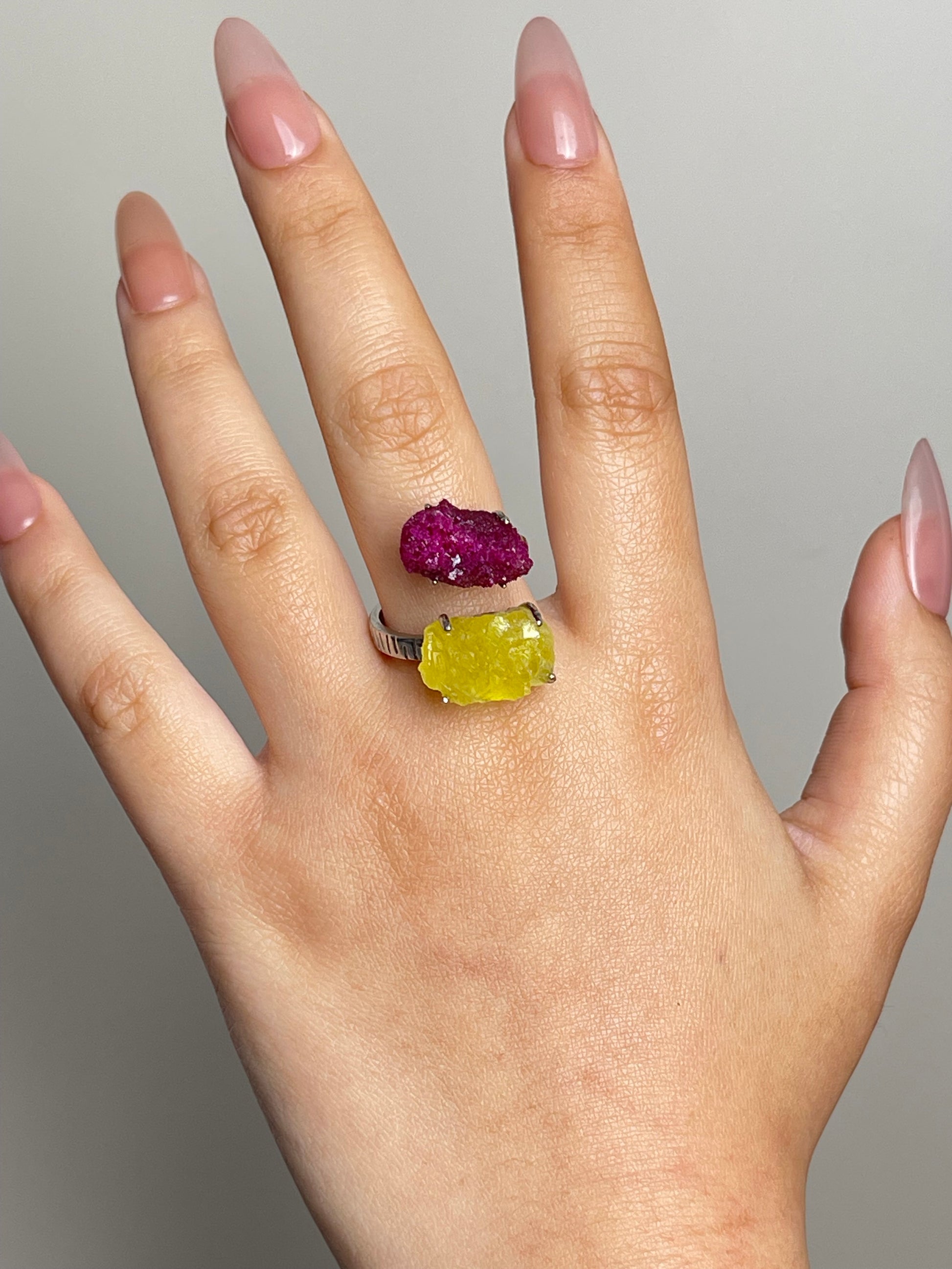 raw red corundum ruby and brucite ring on hand natural crystal jewelry