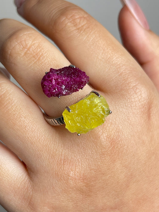 raw red corundum ruby and brucite ring worn on hand