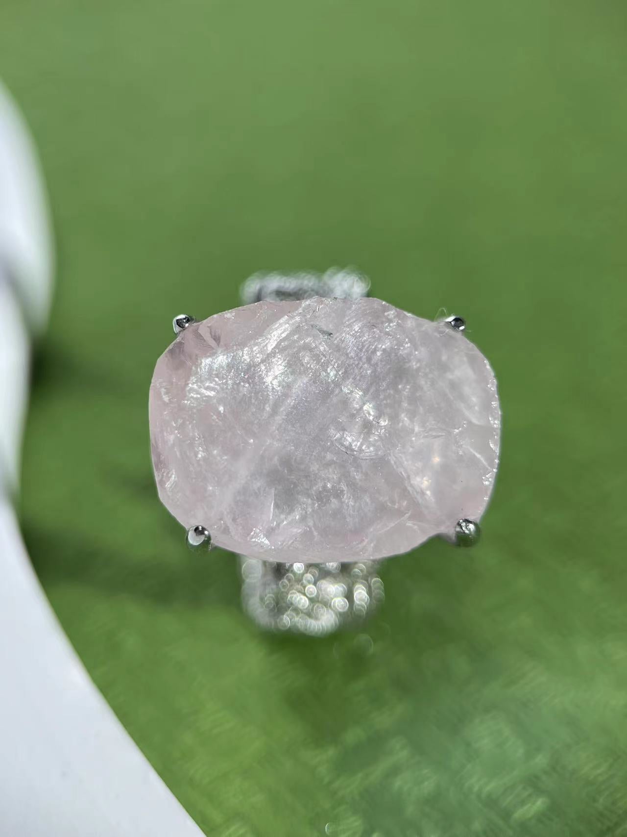 Rose Quartz ring with Twisted Band Setting