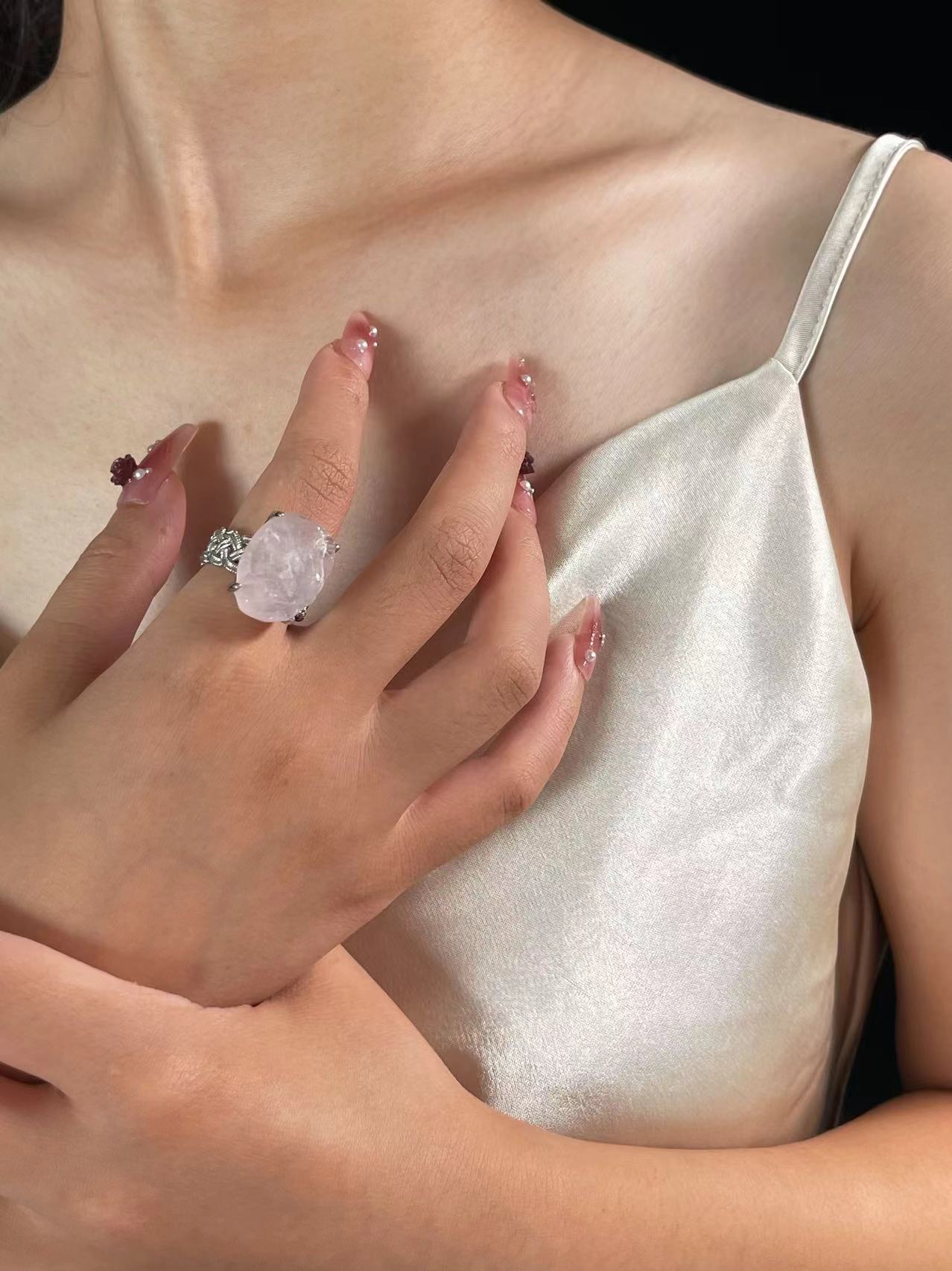 Rose Quartz ring with Twisted Band Setting