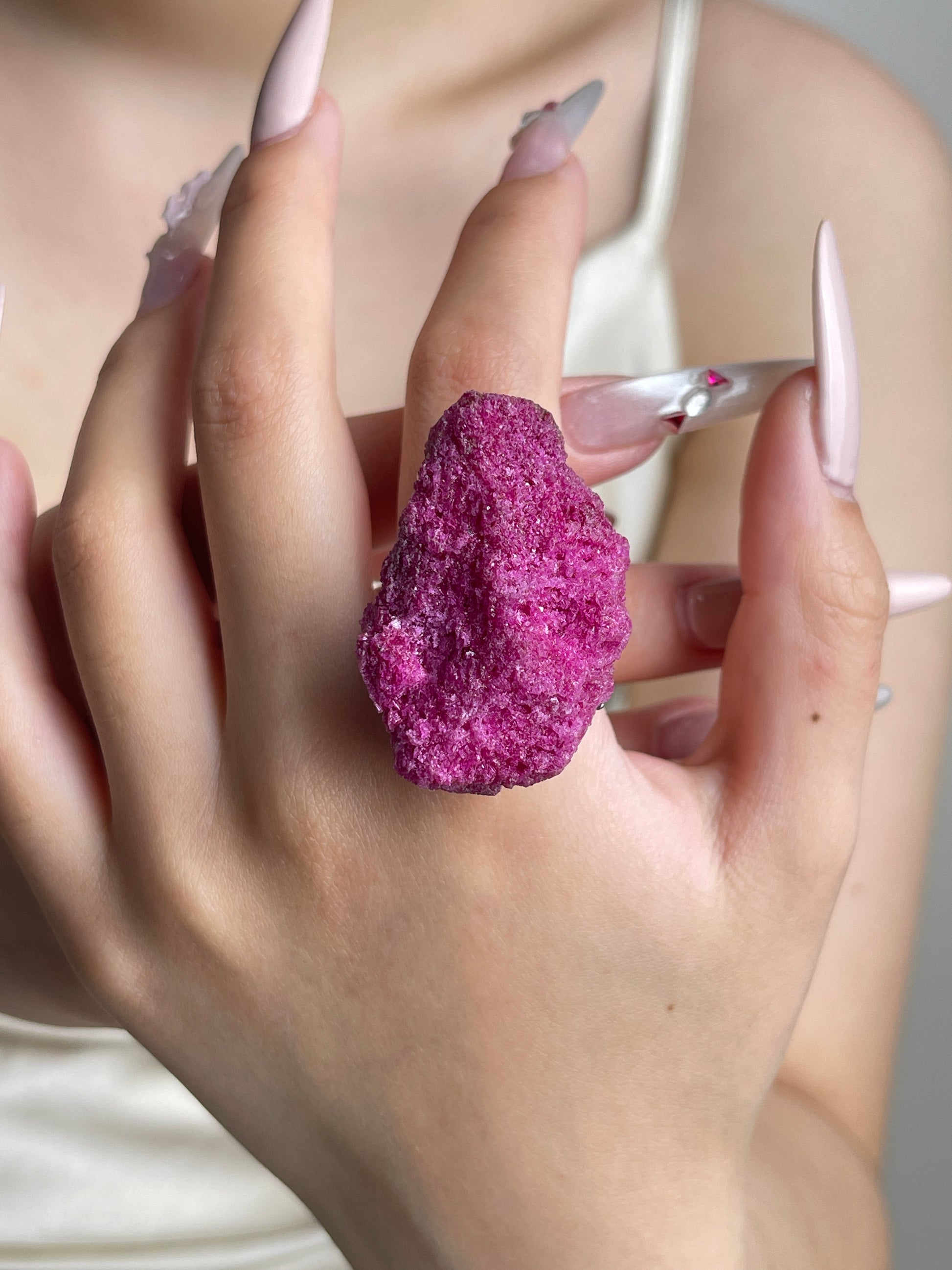 Raw Ruby Red Corundum mineral specimen ring worn on hand