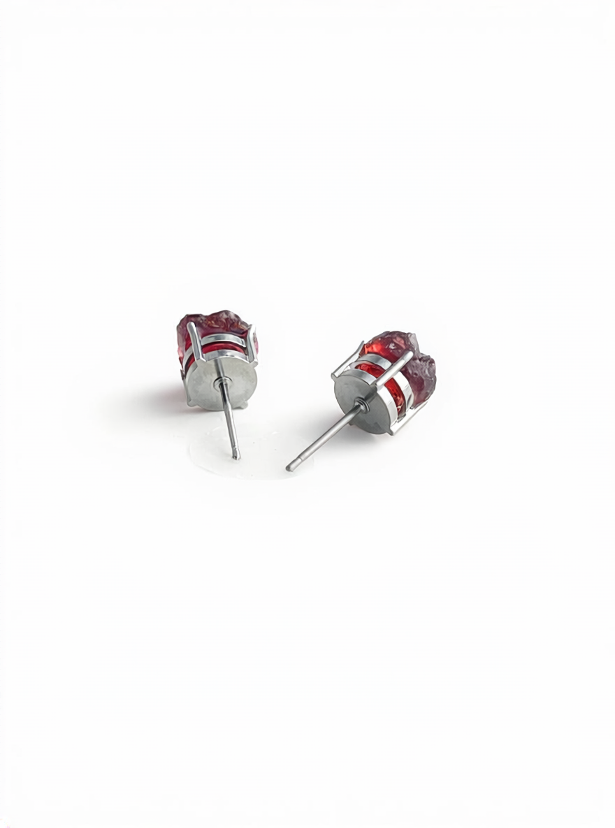 Back view of raw Sri Lankan garnet stud earrings with surgical steel posts