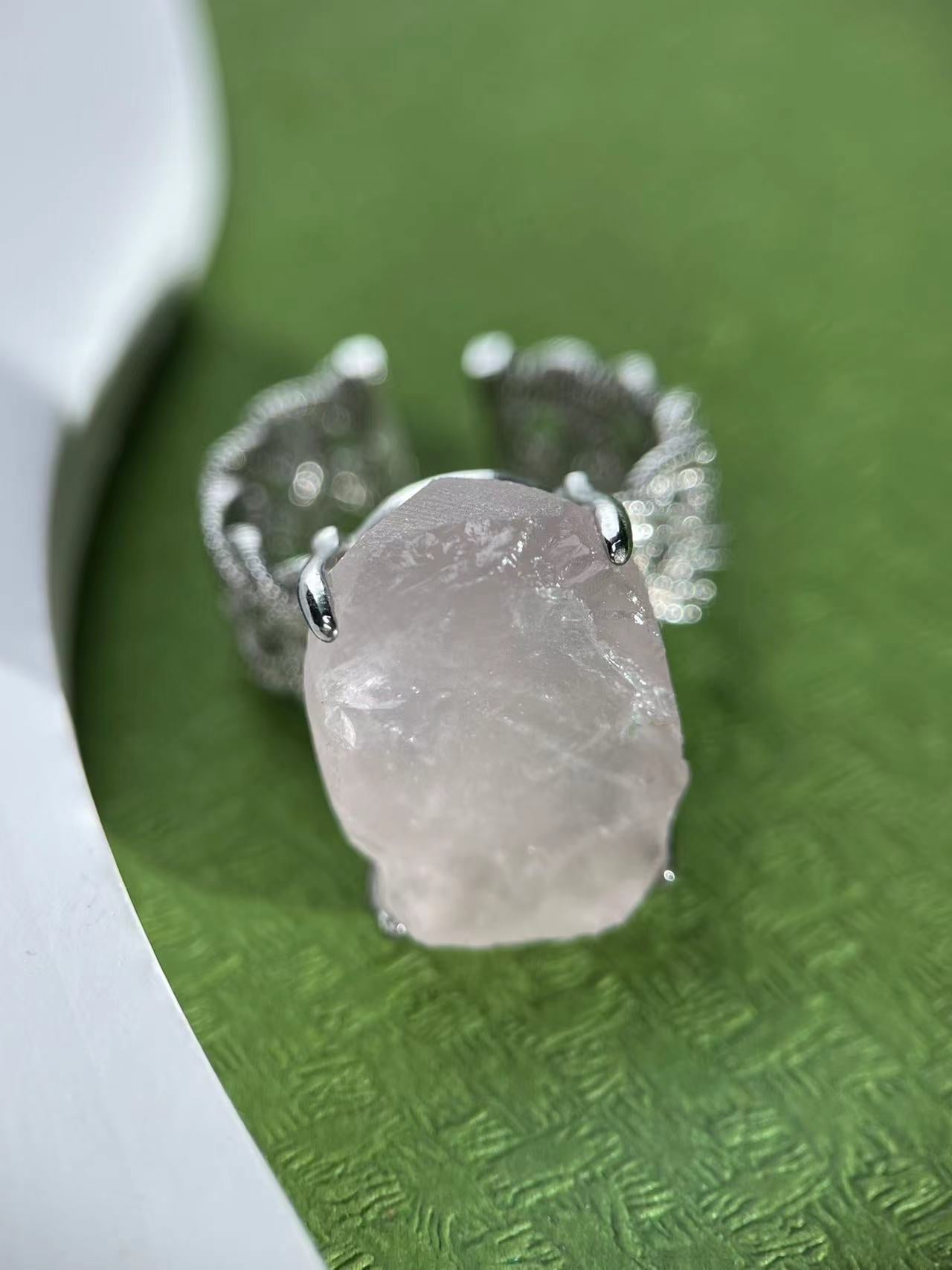 Rose Quartz ring with Twisted Band Setting