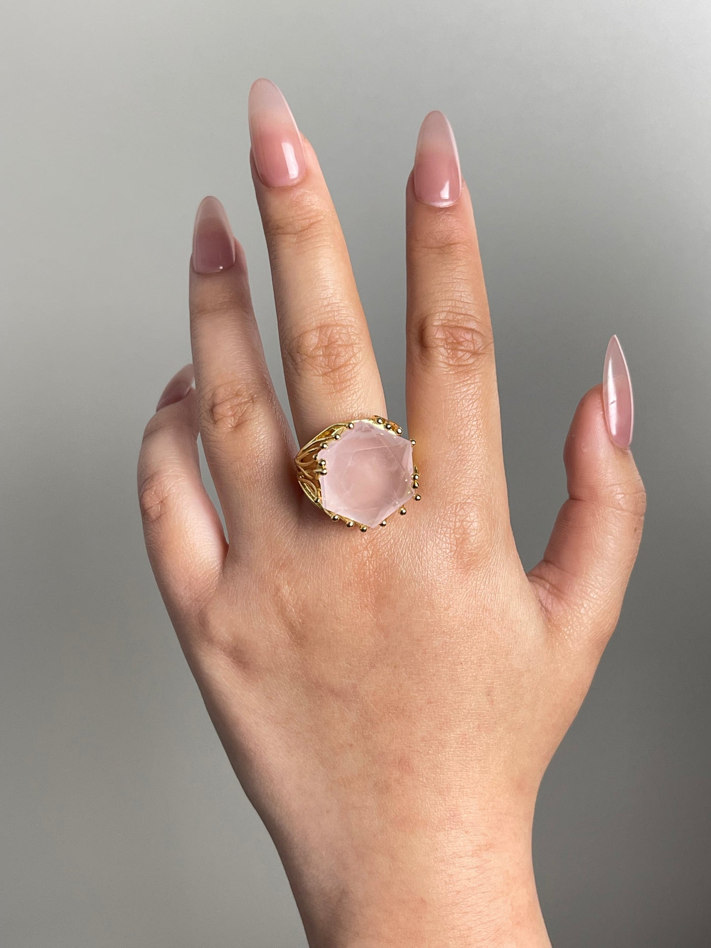 brazilian rose quartz hexagon star ring worn on hand
