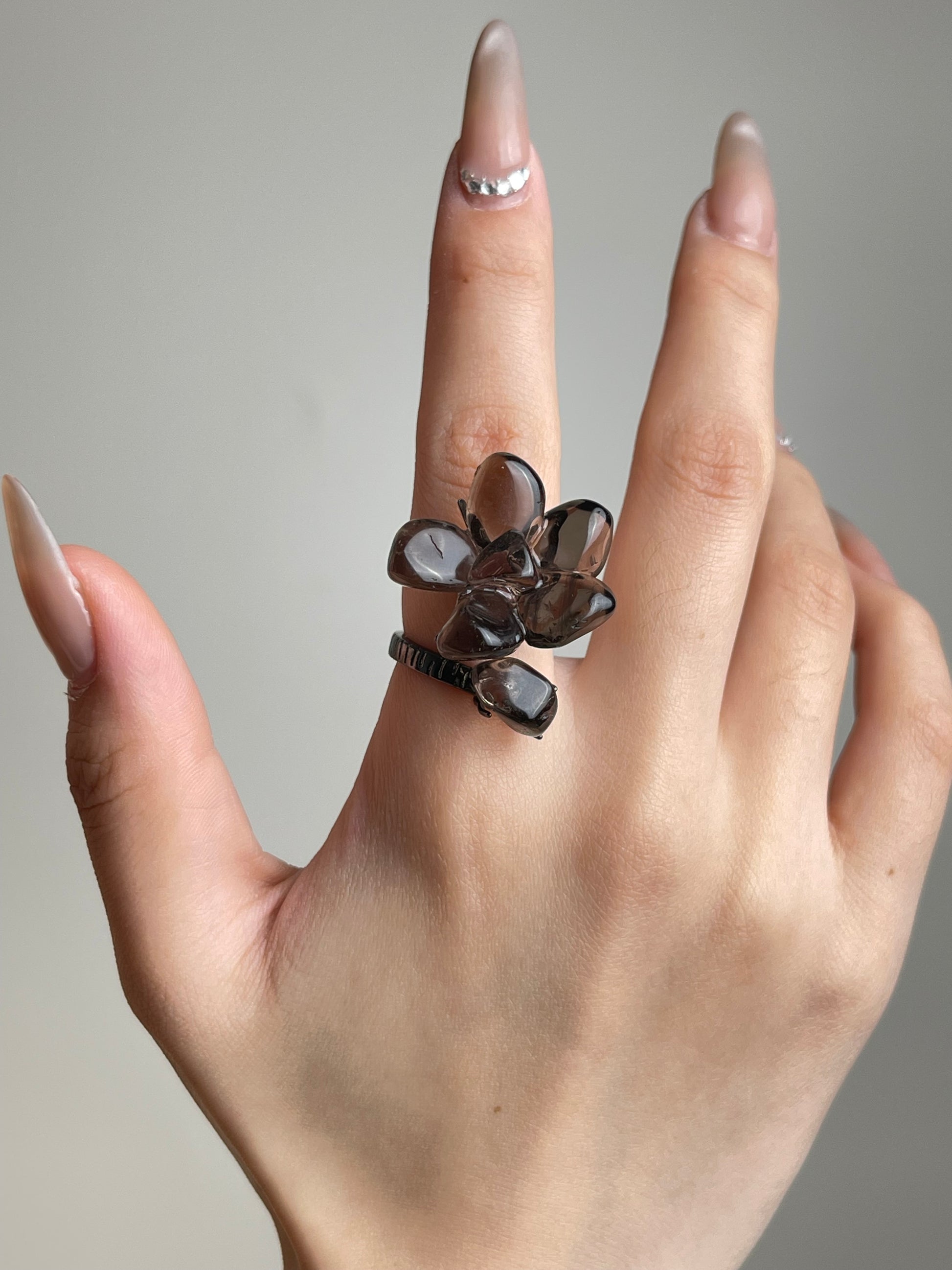 Hand shot of Smoky Quartz flower ring by Oryssia