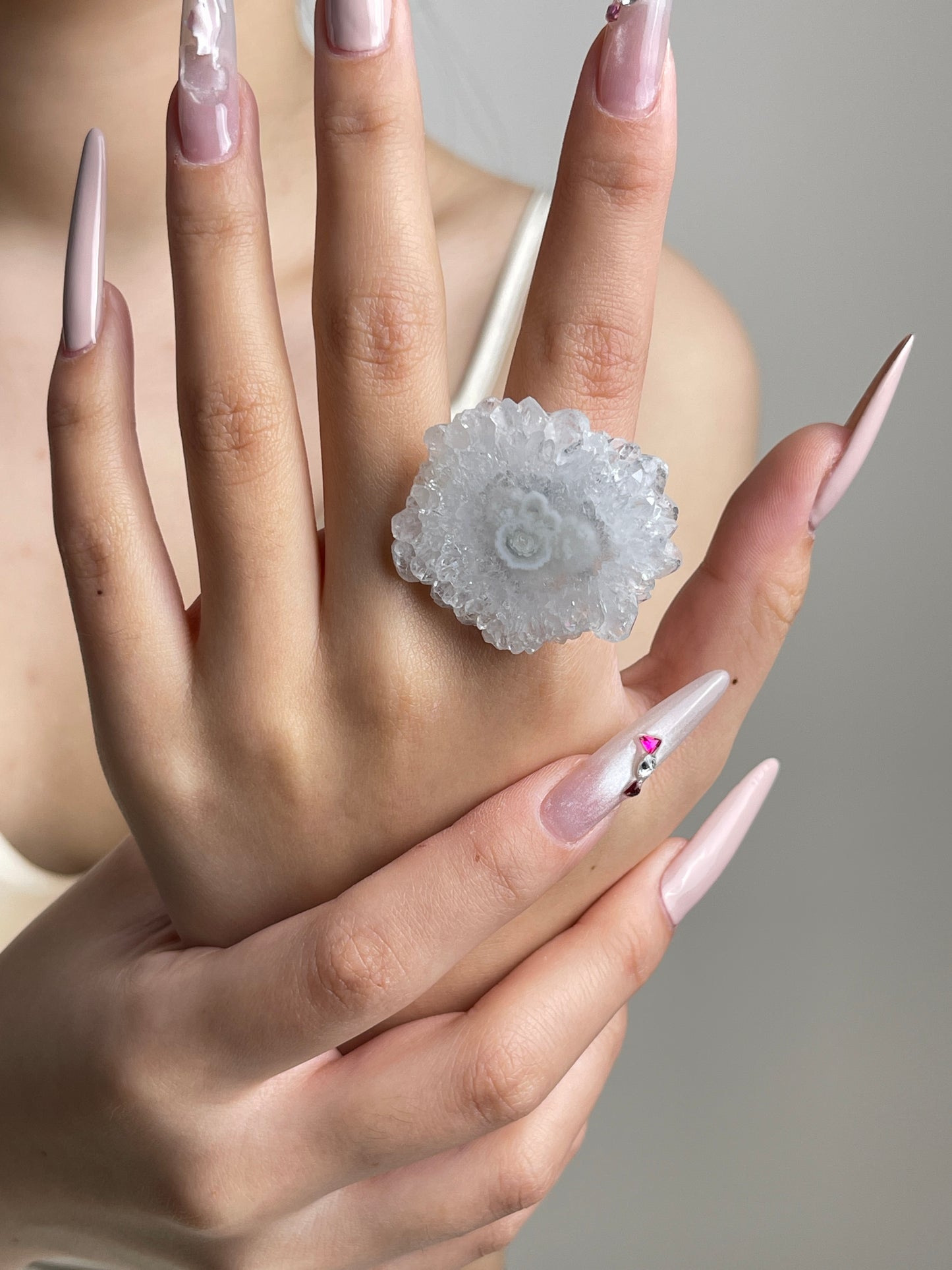 Solar Quartz Slice Ring worn on hand as natural crystal jewelry
