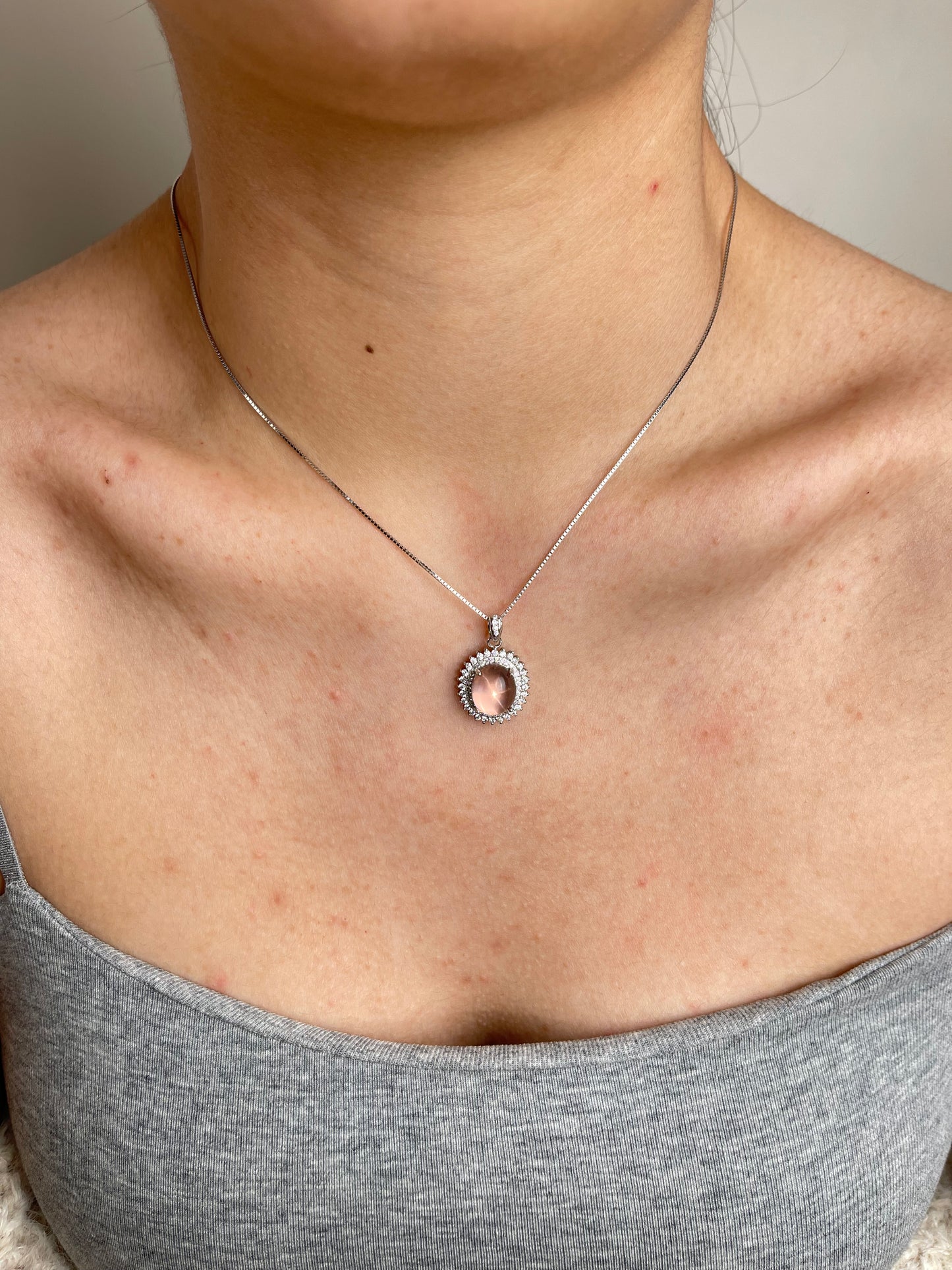 Star rose quartz necklace Madagascar worn on neck