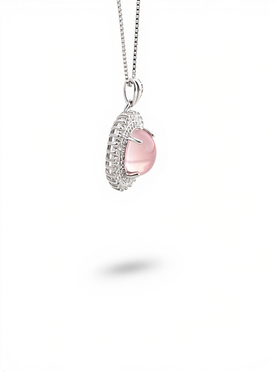Side view of star rose quartz cabochon necklace