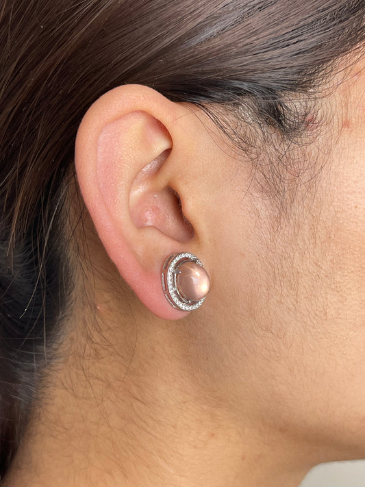 Star Rose Quartz Stud Earrings close-up worn on ear