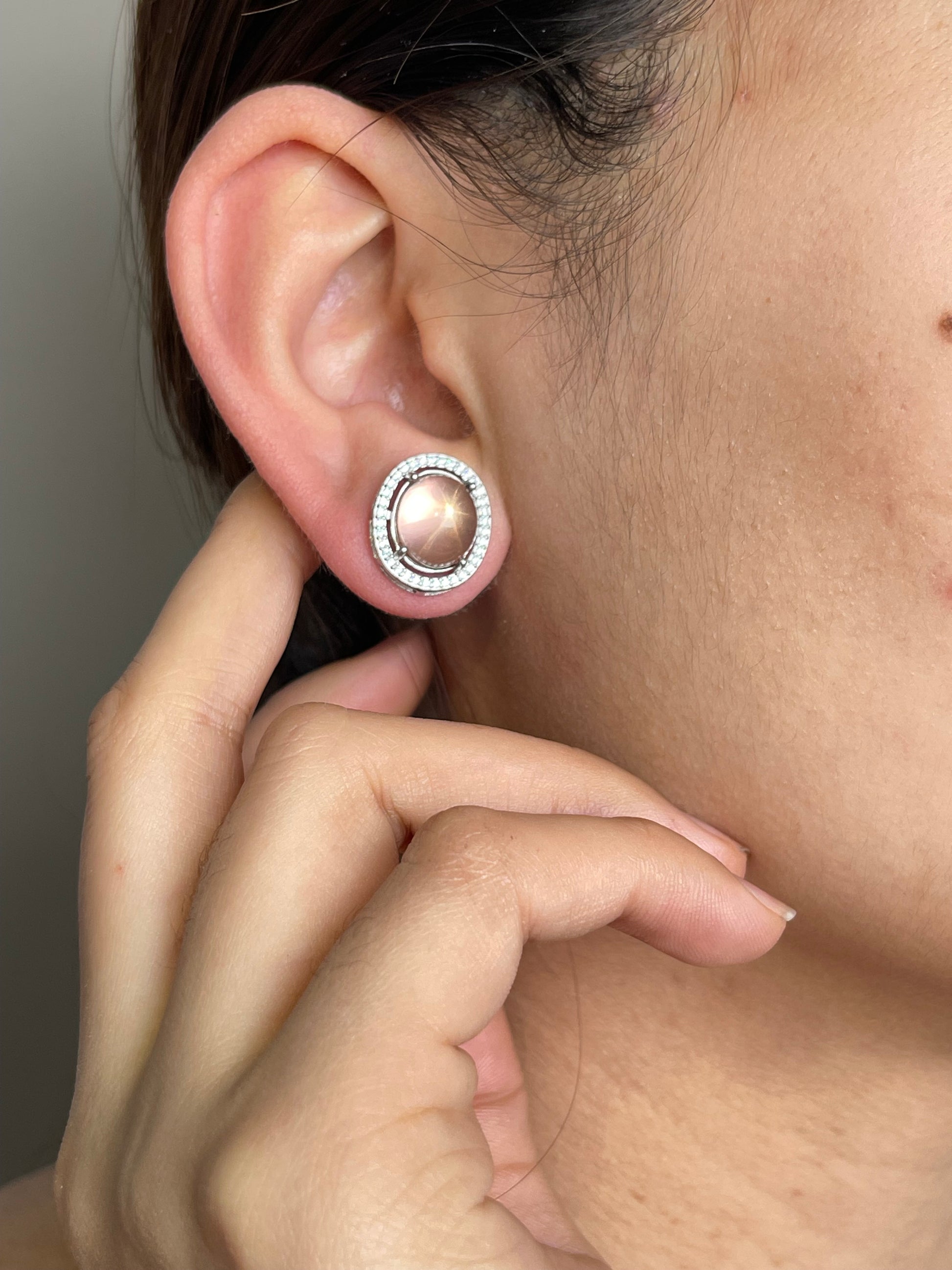 Star Rose Quartz Stud Earrings worn on ear
