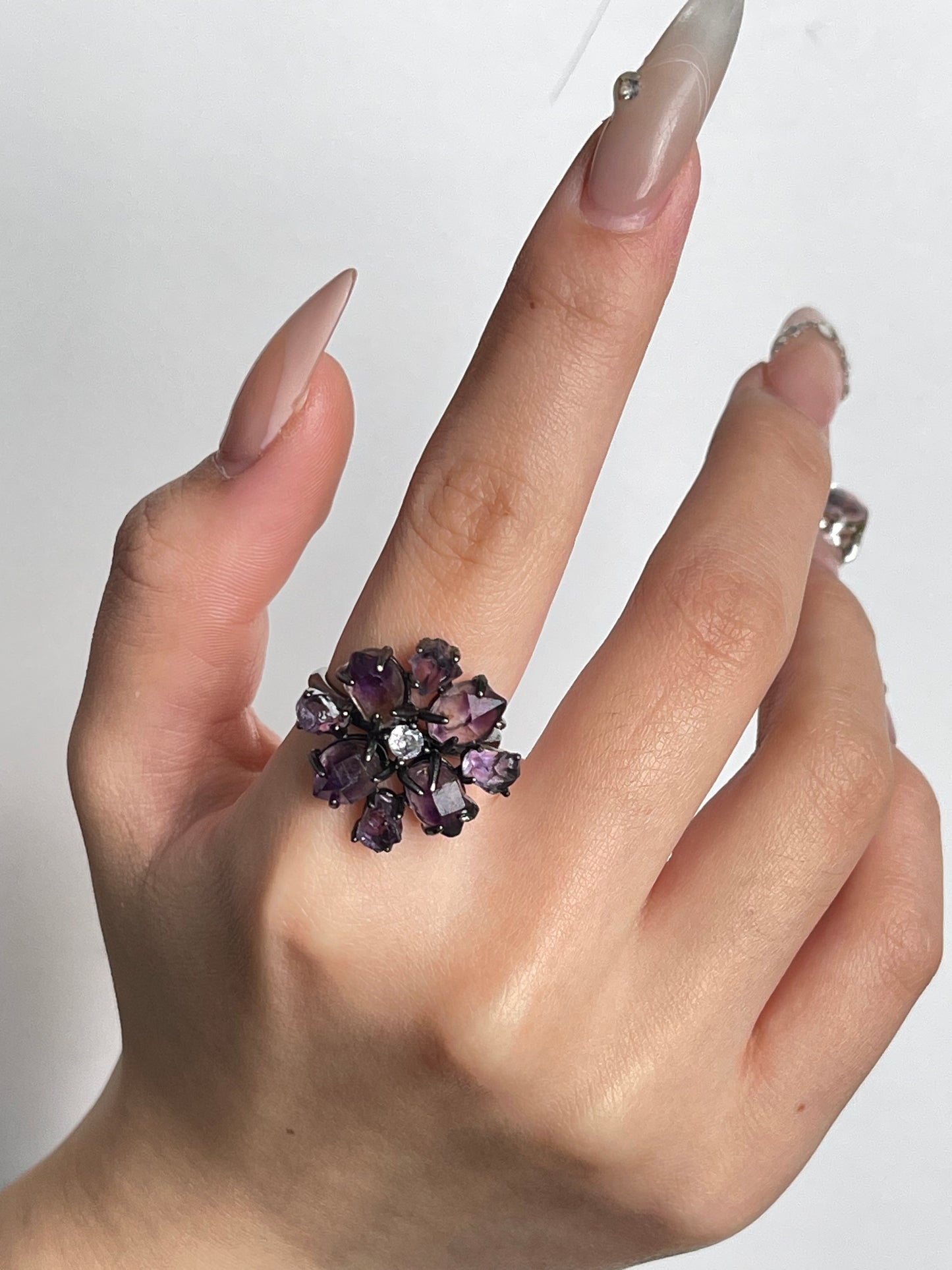 close up super seven amethyst crystal blossom ring