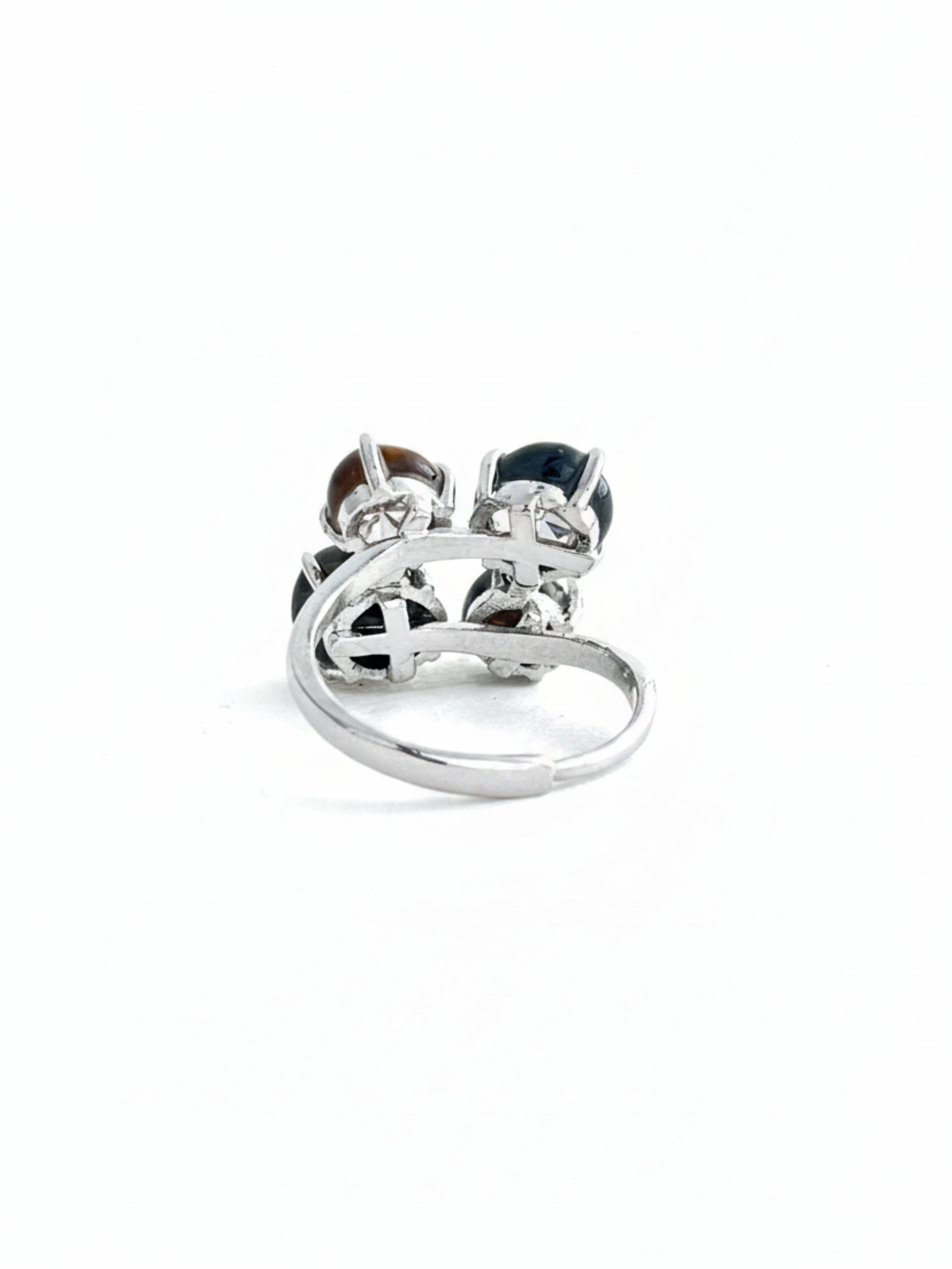 Back view of tiger’s eye and blue tiger’s eye ring showing adjustable open band and four-stone setting