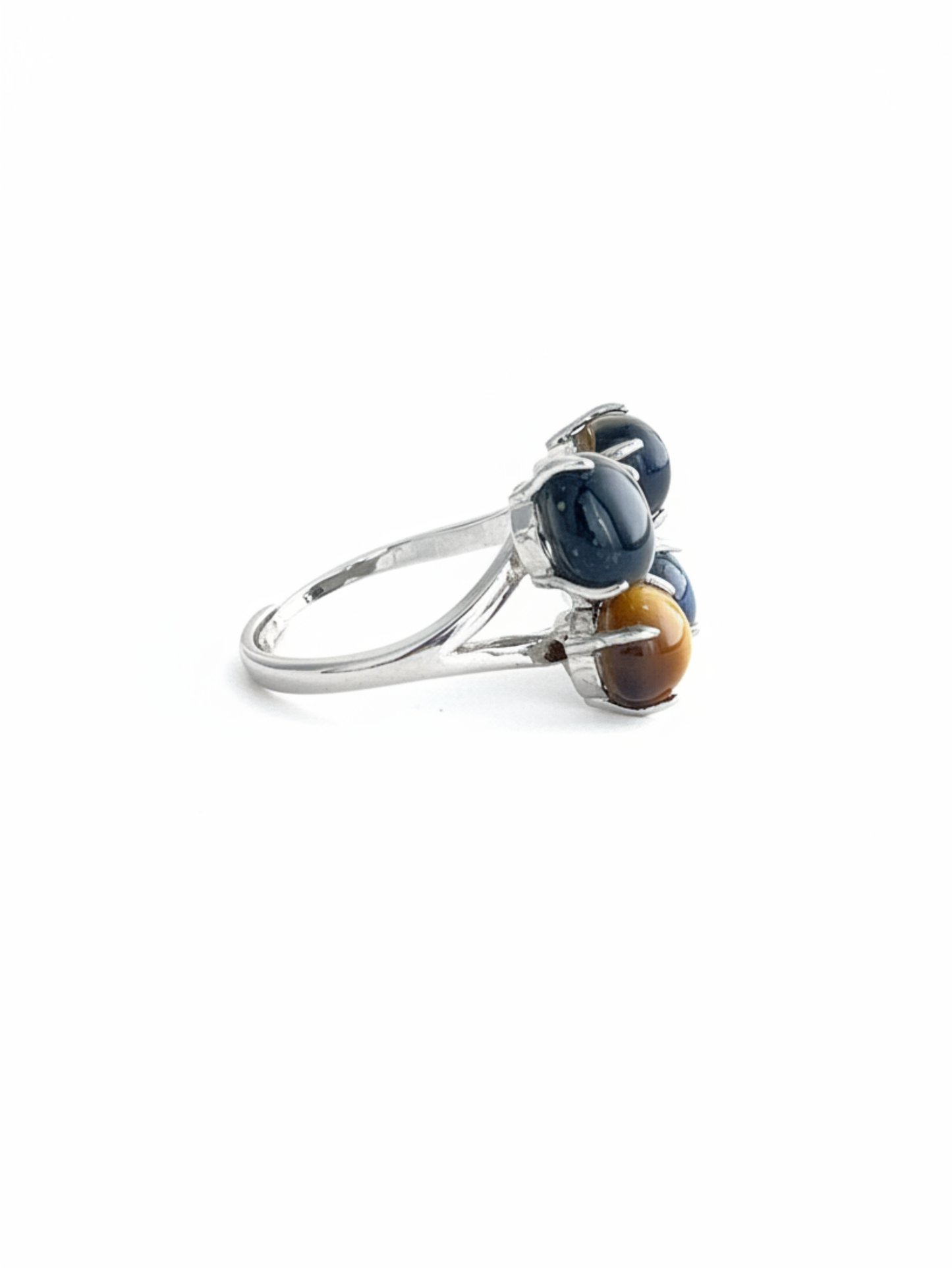 Side view of tiger’s eye and blue tiger’s eye ring with dark metal setting and polished stones