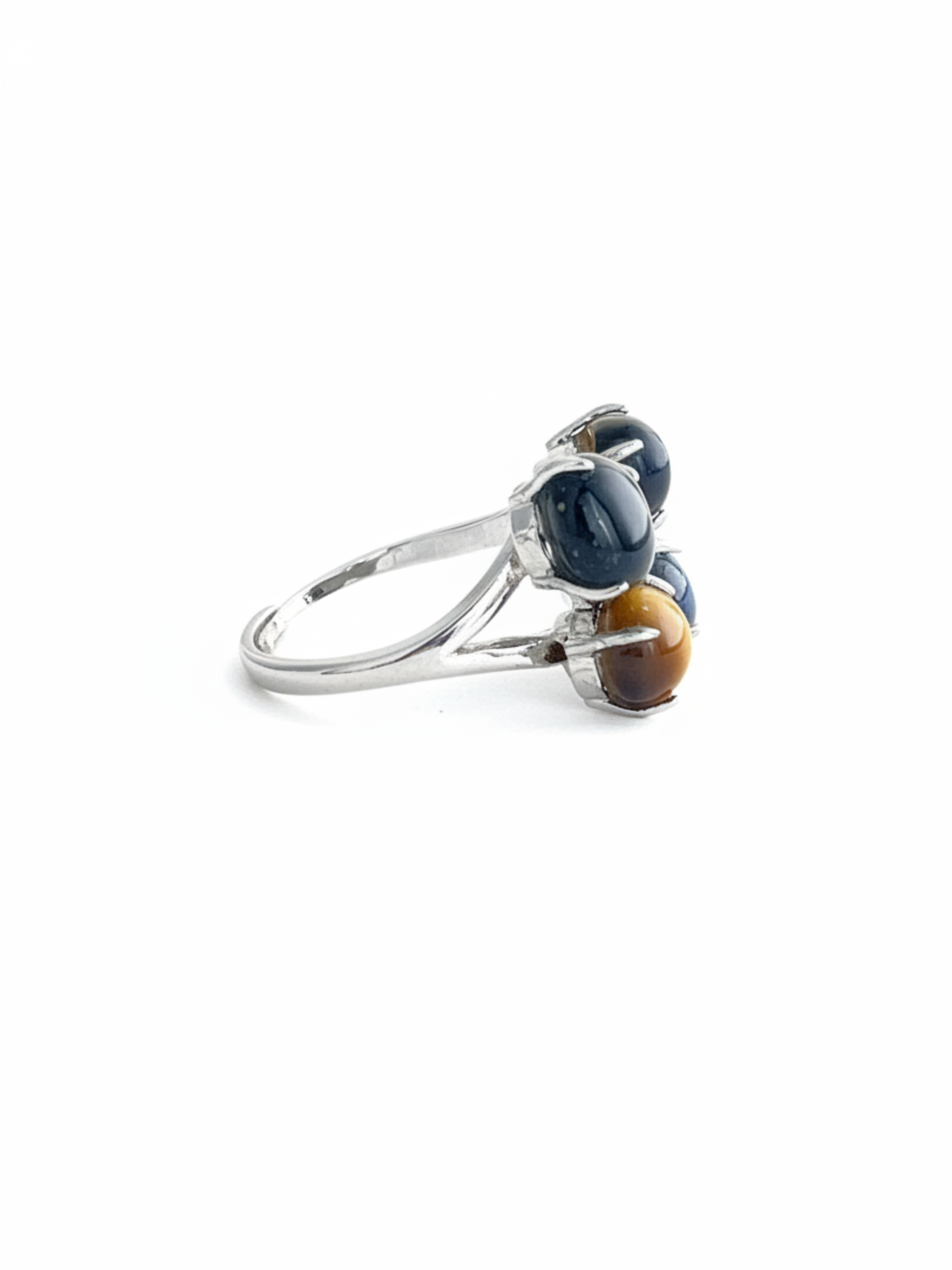 Side view of tiger’s eye and blue tiger’s eye ring with dark metal setting and polished stones