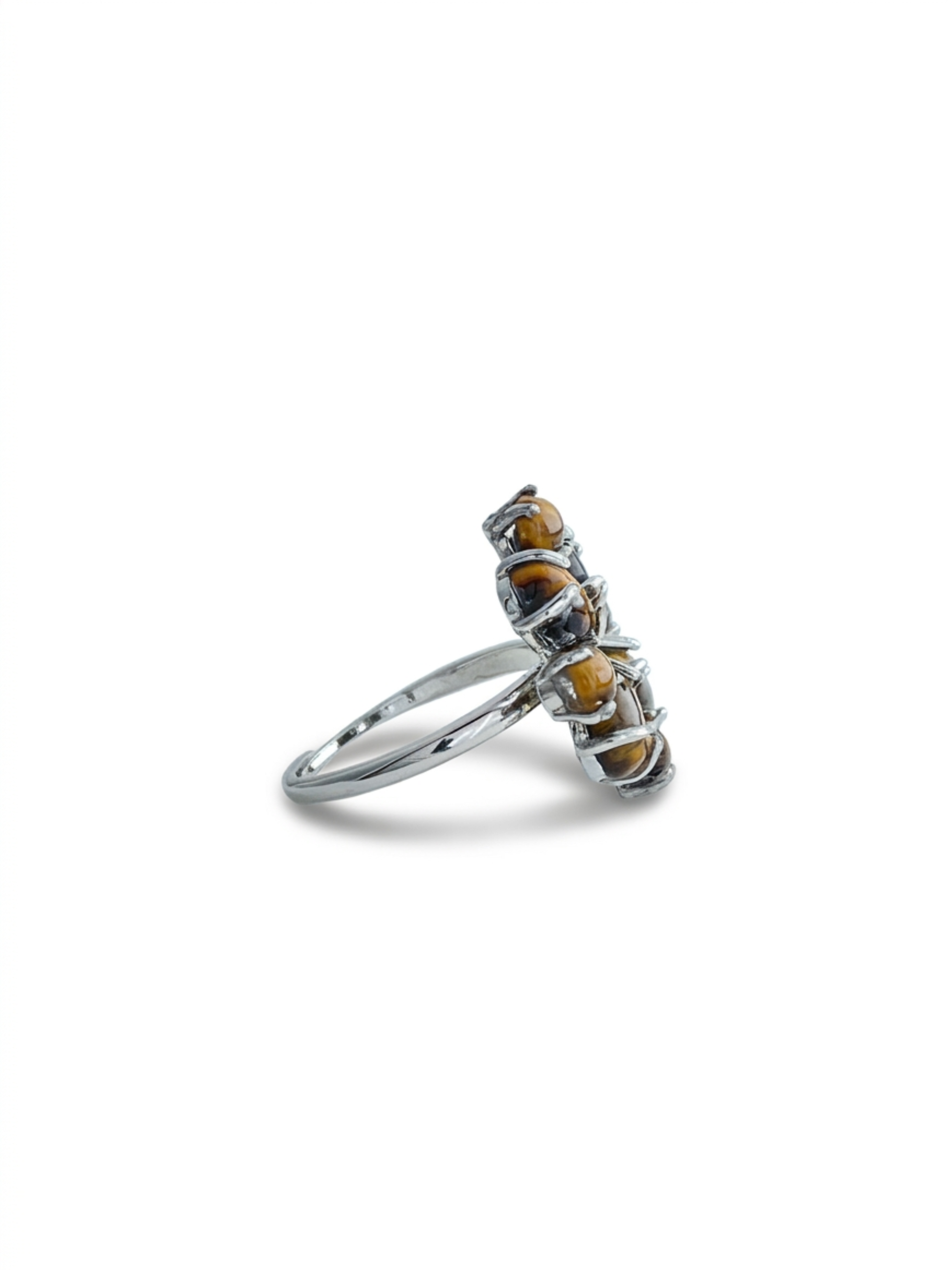 Side view of tiger’s eye cabochon cluster ring