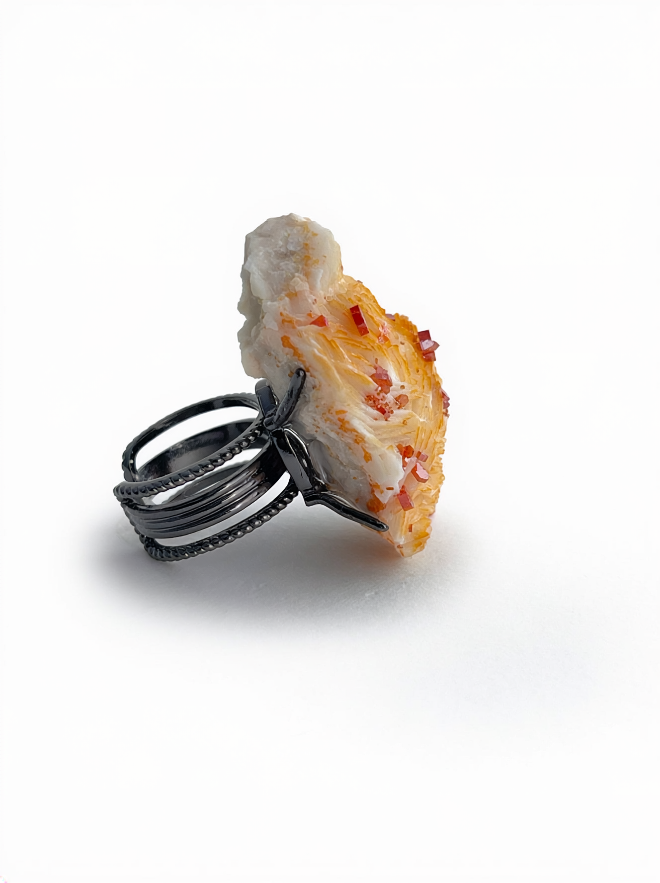 Side view of Vanadinite on Barite mineral specimen ring