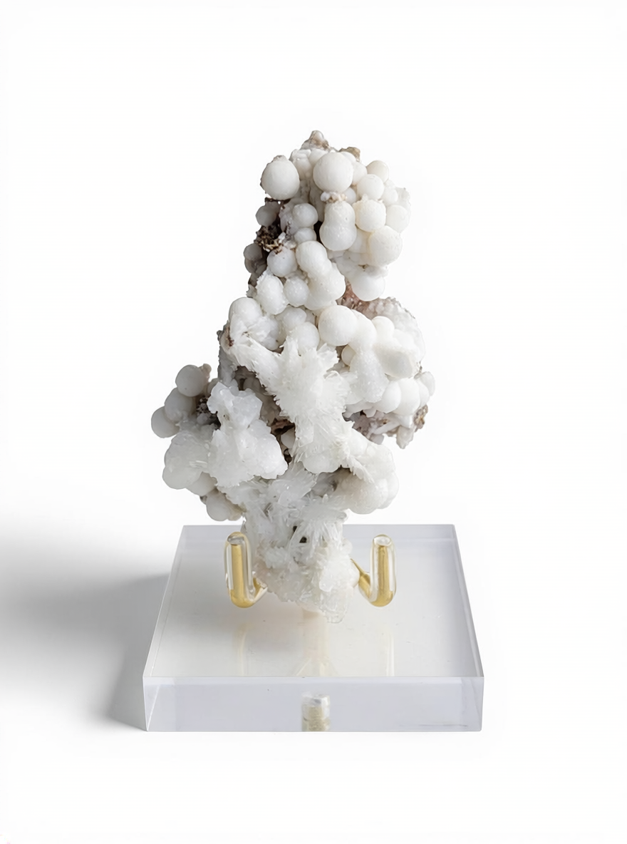 white botryoidal calcite with radiating aragonite on matrix front view