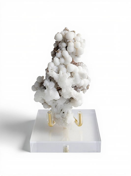 white botryoidal calcite with radiating aragonite on matrix front view